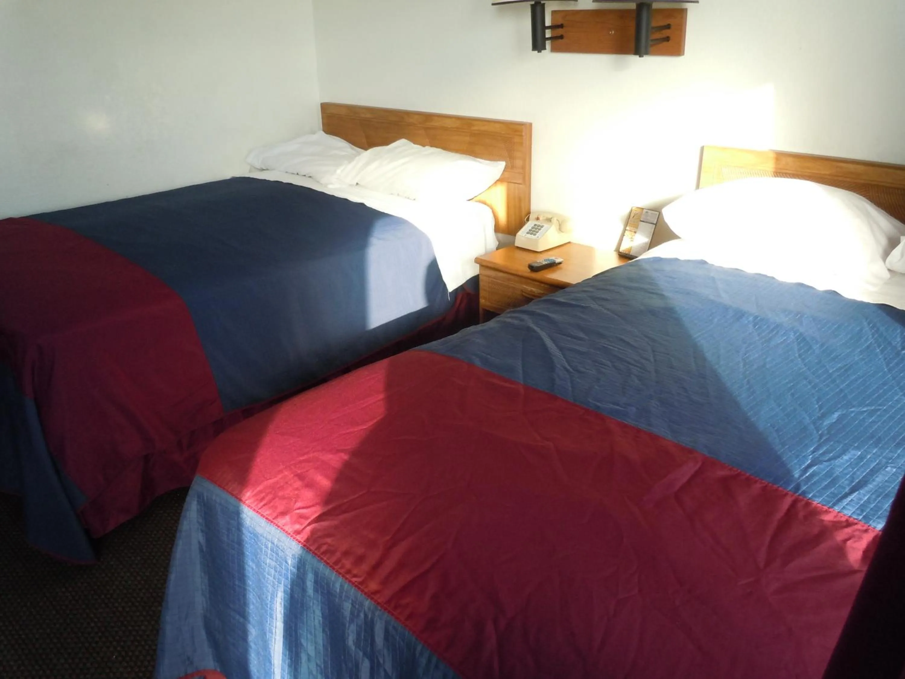 Photo of the whole room, Bed in Travelodge by Wyndham Grand Rapids North