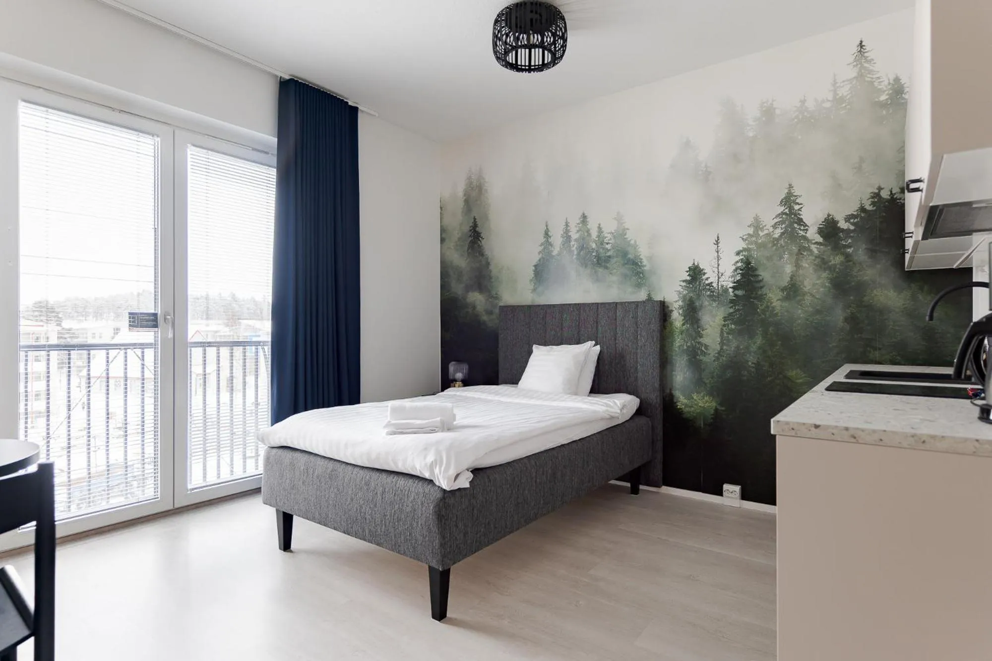 Bed in Hotelli Kuohu Kangasala - Hotel and Apartments by UHANDA