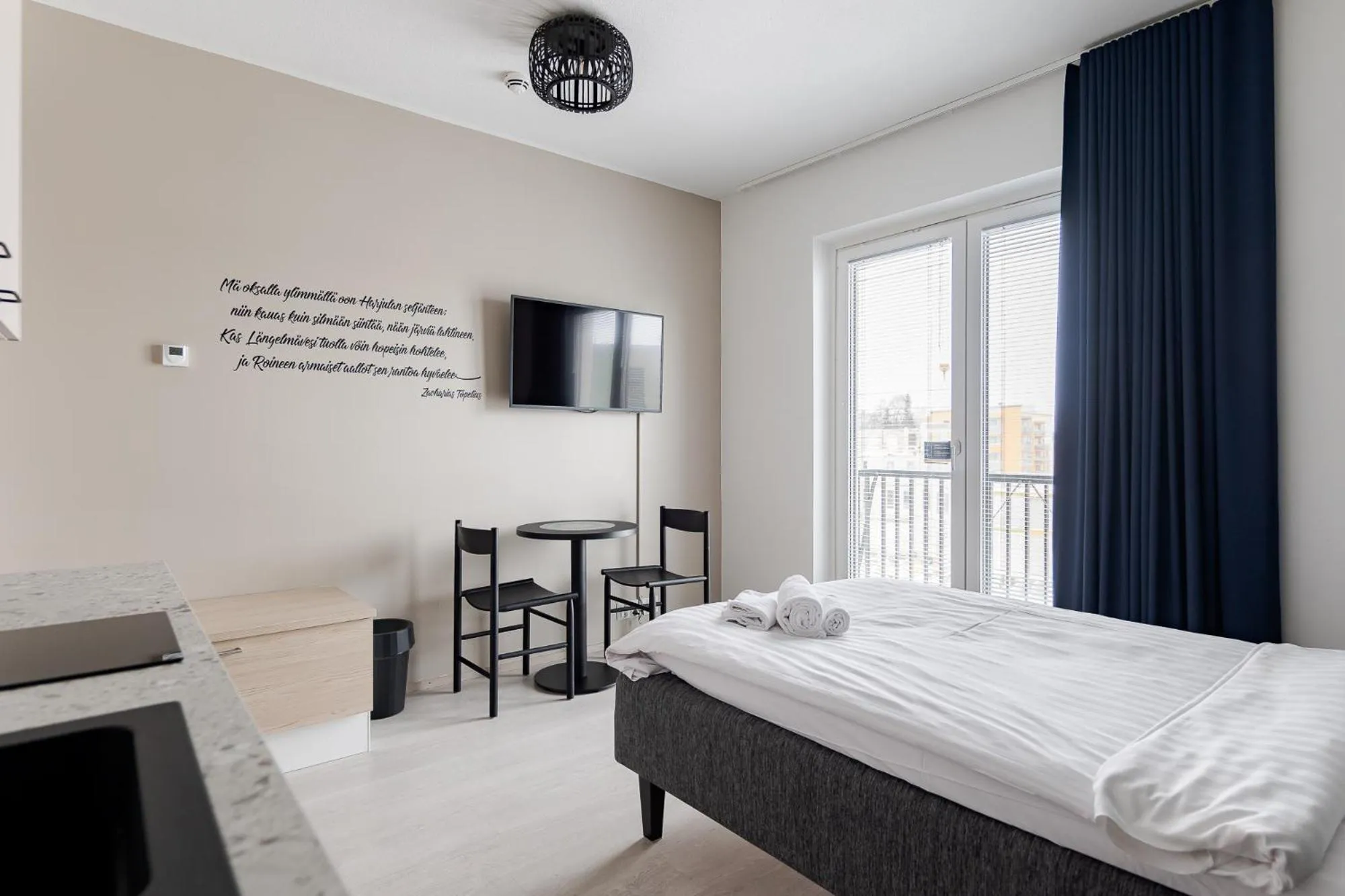 Bed in Hotelli Kuohu Kangasala - Hotel and Apartments by UHANDA