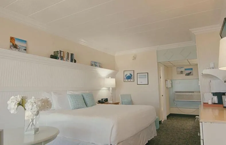 Bed in Gaido's Seaside Inn