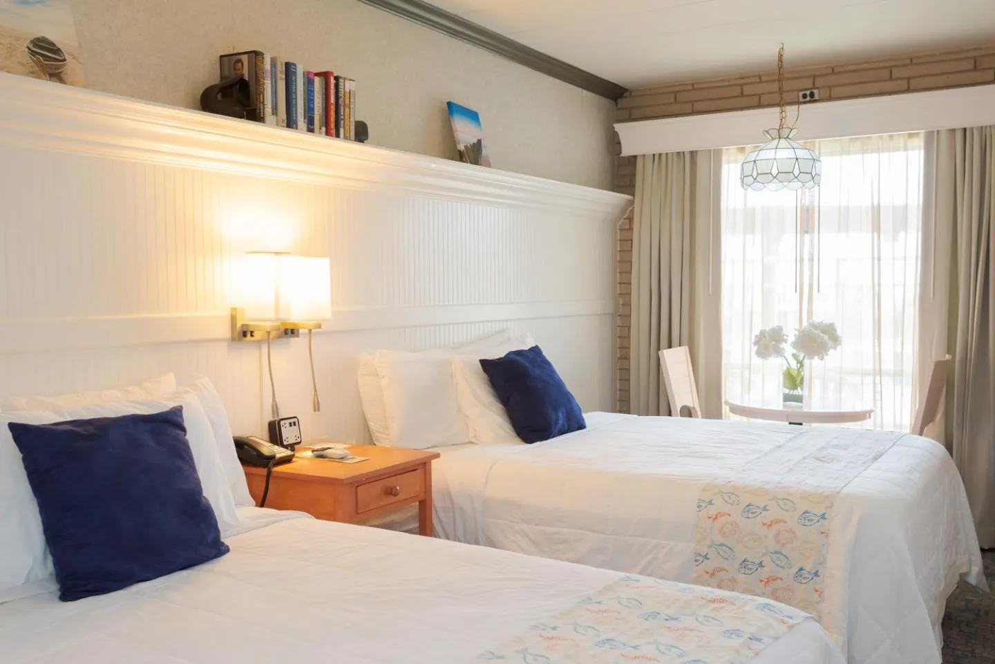 Bed in Gaido's Seaside Inn