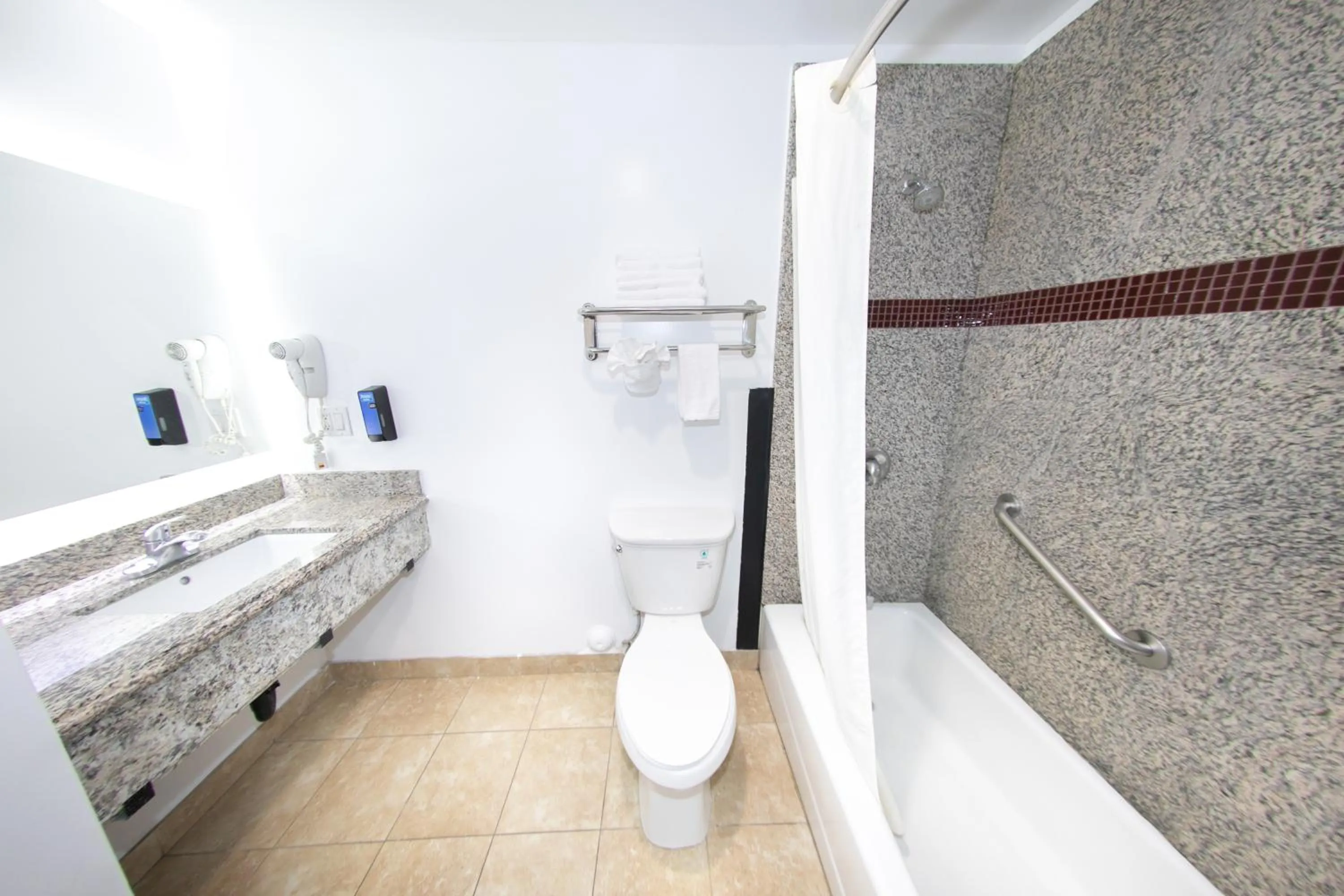 Bathroom in Rodeway Inn & Suites Bellflower