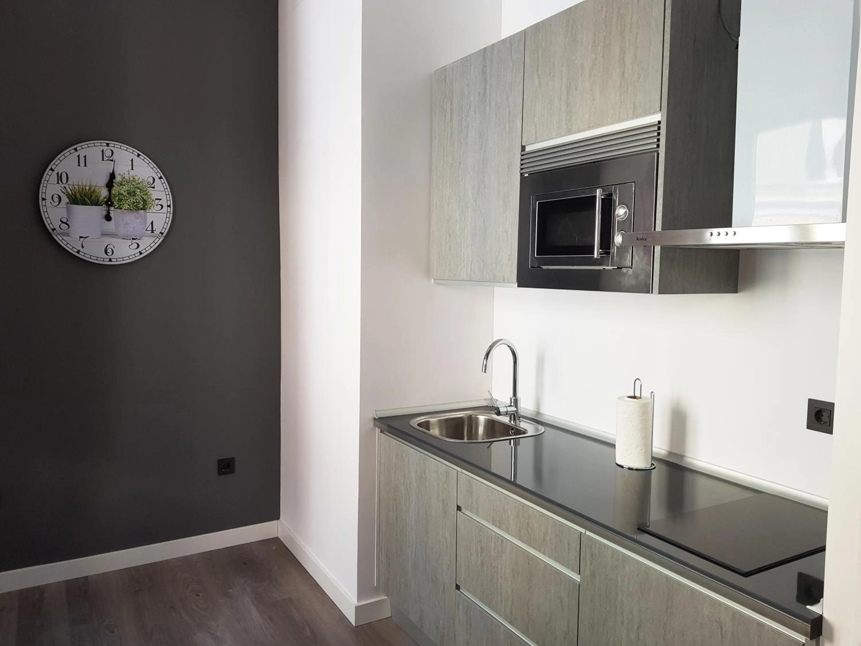 Kitchen or kitchenette in Apartamentos Granada Deluxe 3000