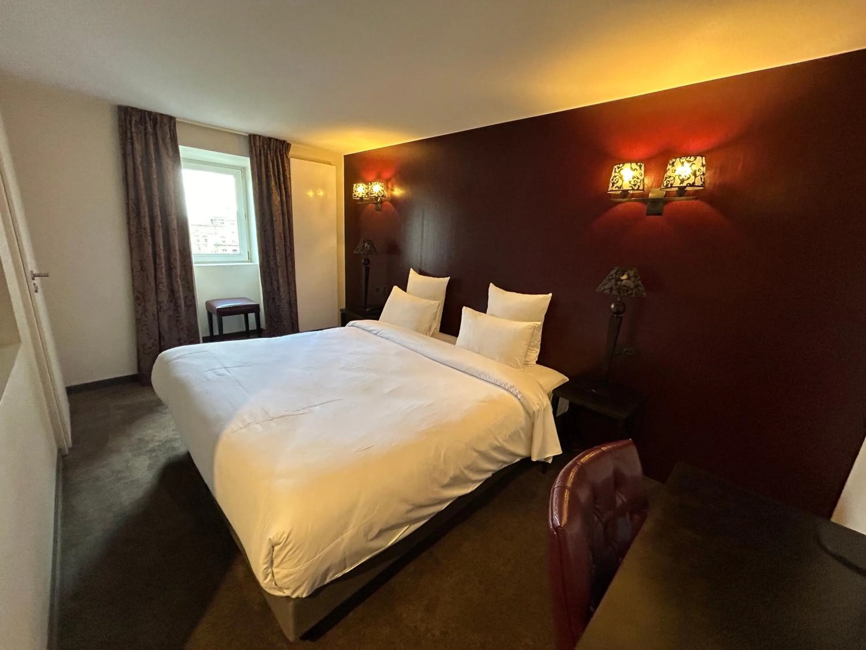 Bedroom in Hôtel Le Bristol Strasbourg Gare