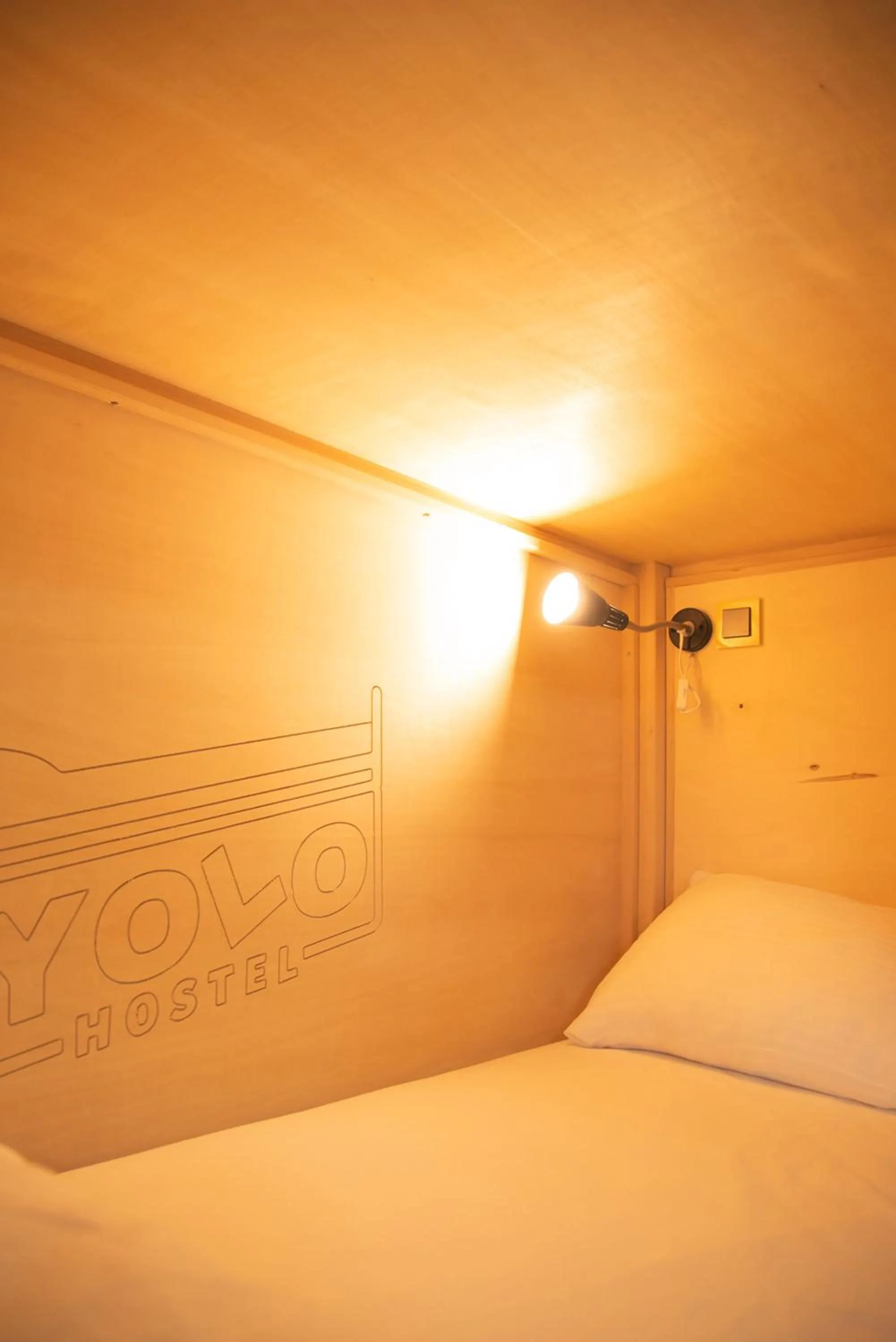 Bed in YOLO Hostel