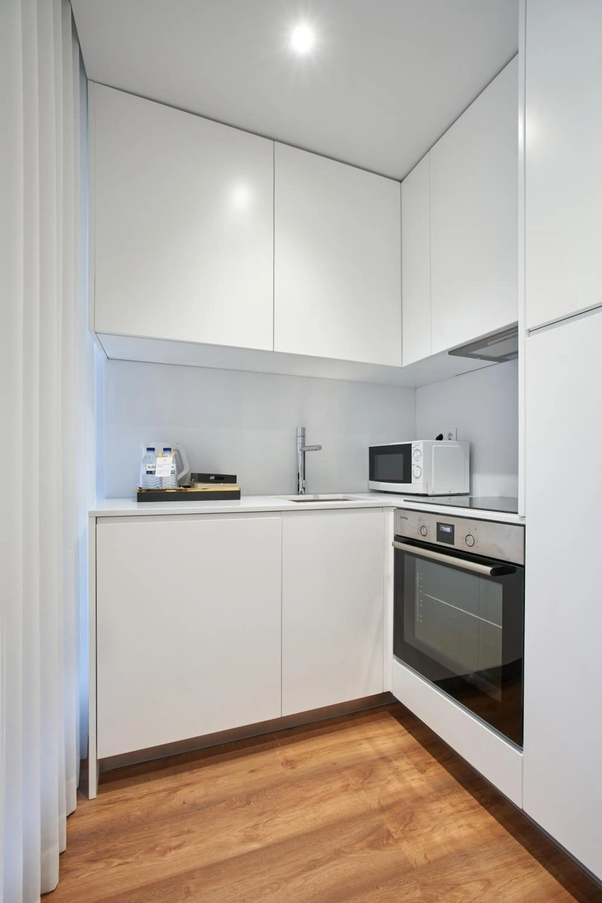 Kitchen or kitchenette in Signature Apartments Santa Catarina