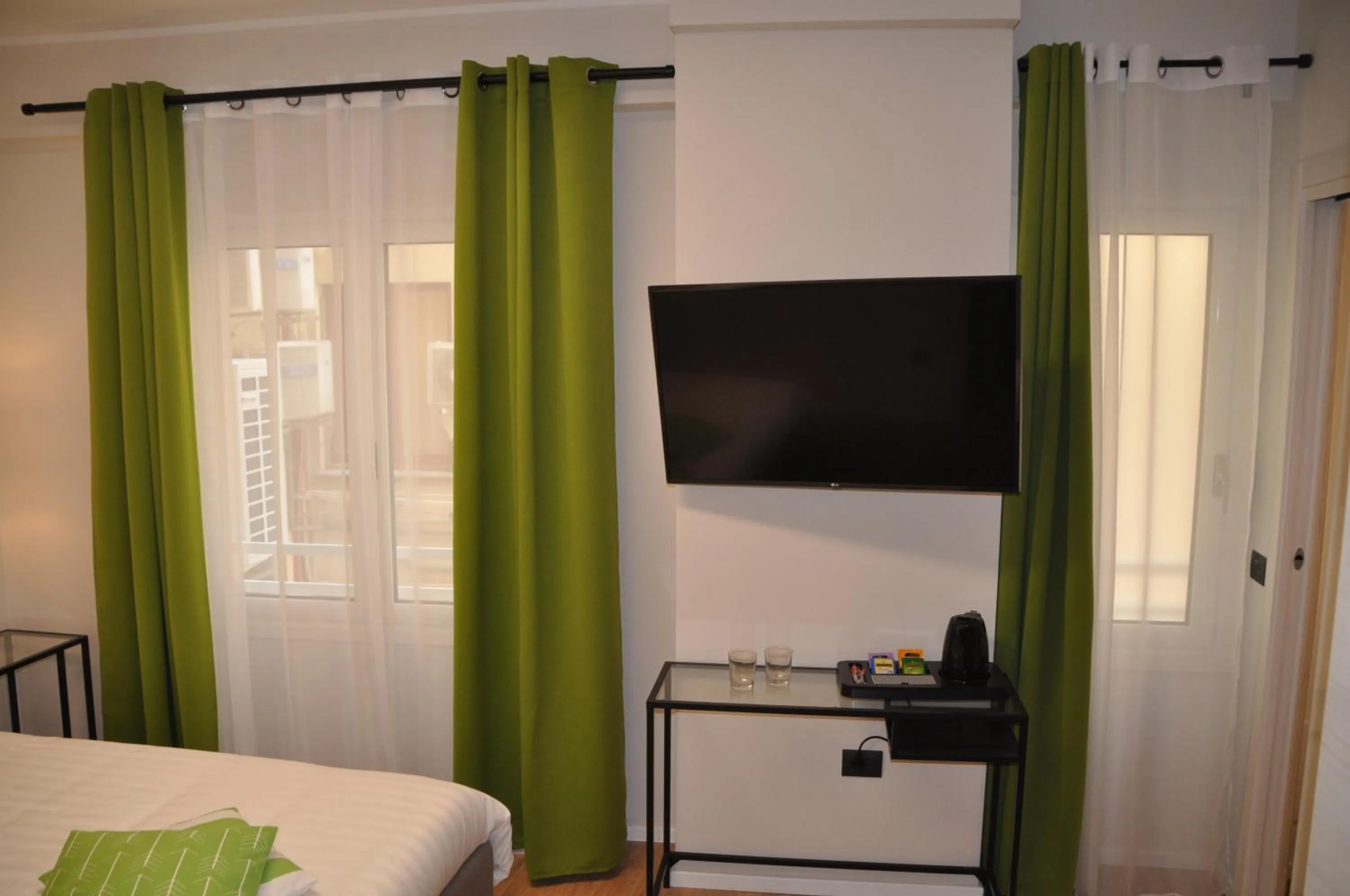 TV and multimedia, Bed in EVA LUXURY ROOMS CAGLIARI