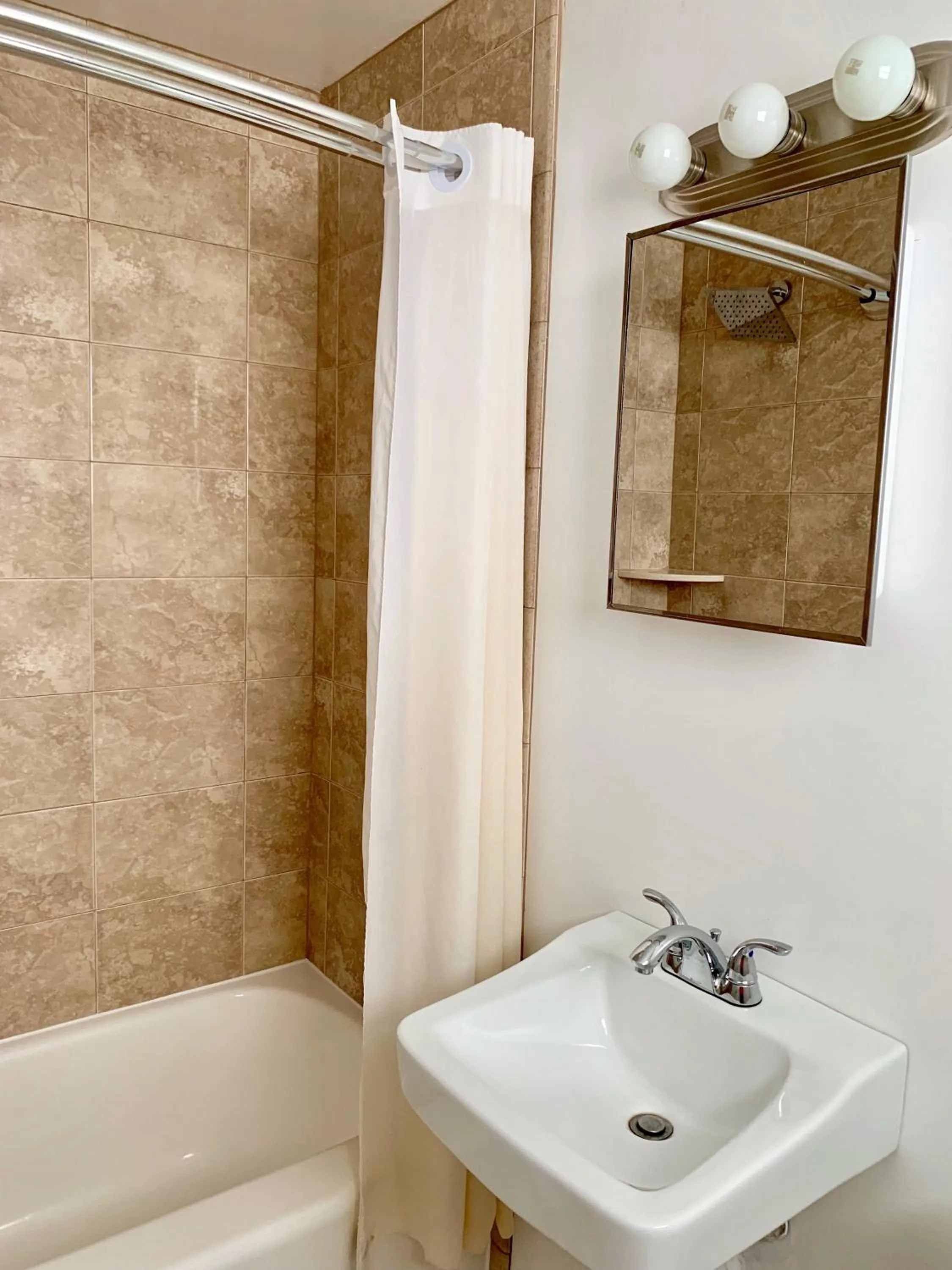 Shower in White Caps Motel