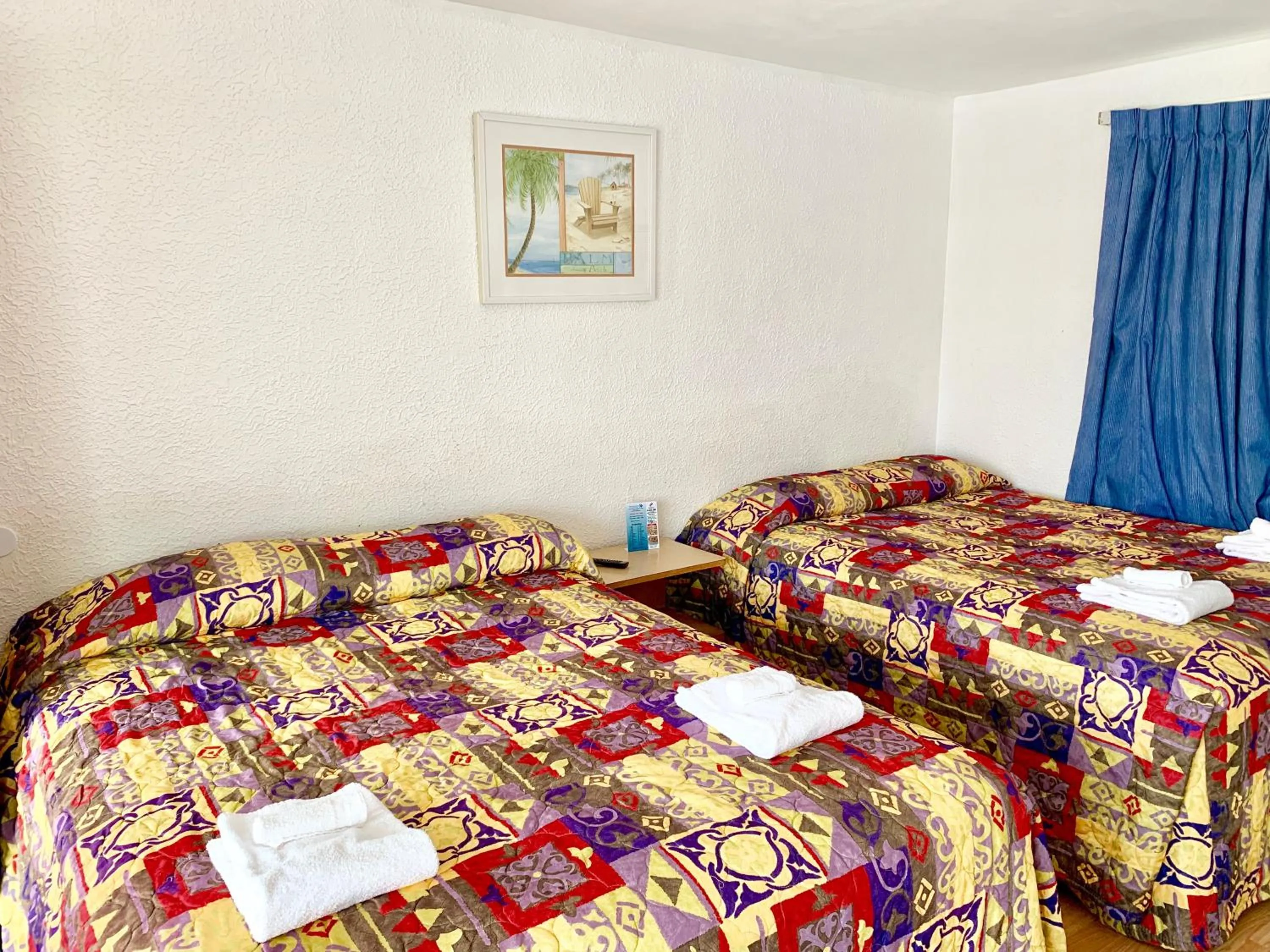 Bed in White Caps Motel