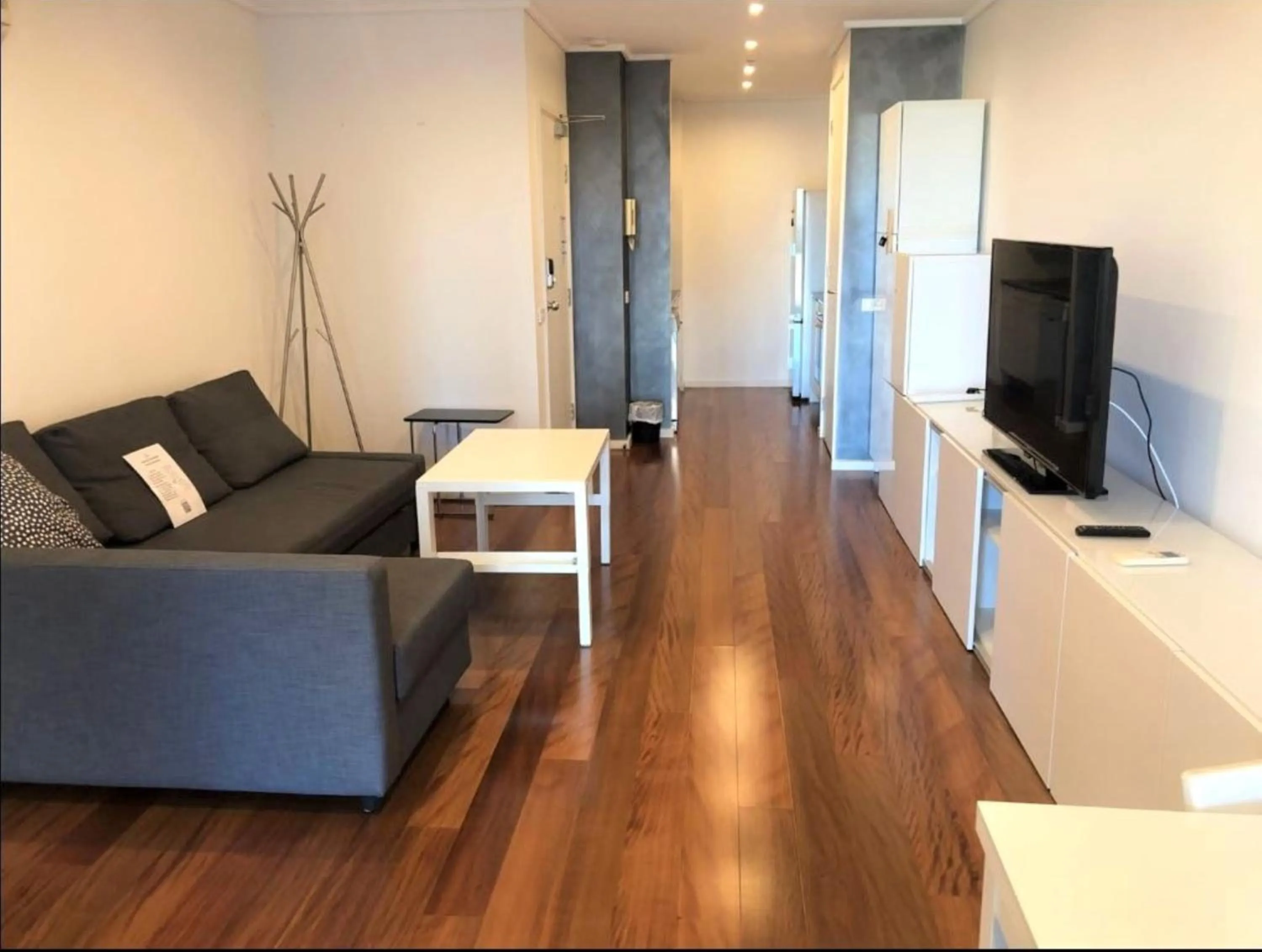 Living room in ReadySet Apartments at City Tower