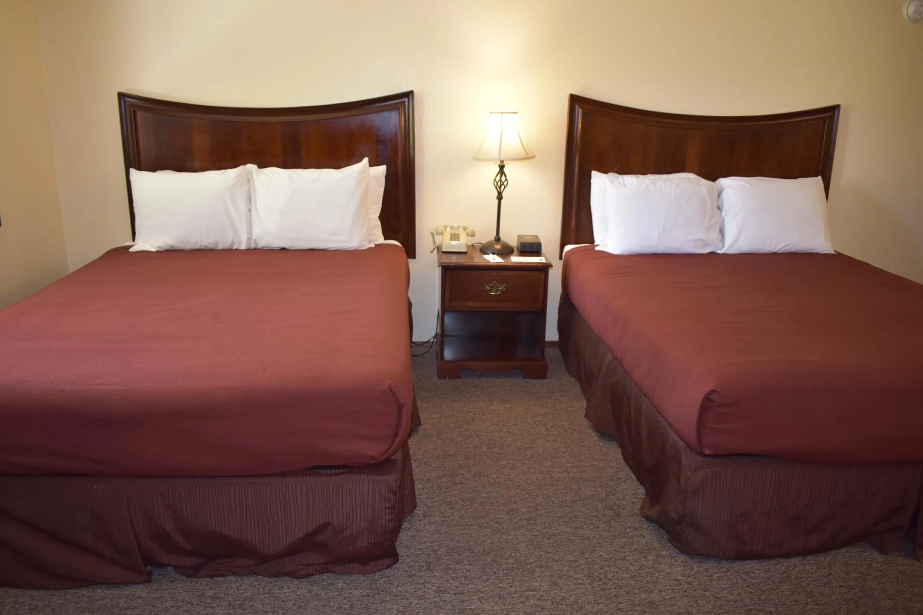 Bed in Lazy J Ranch Motel