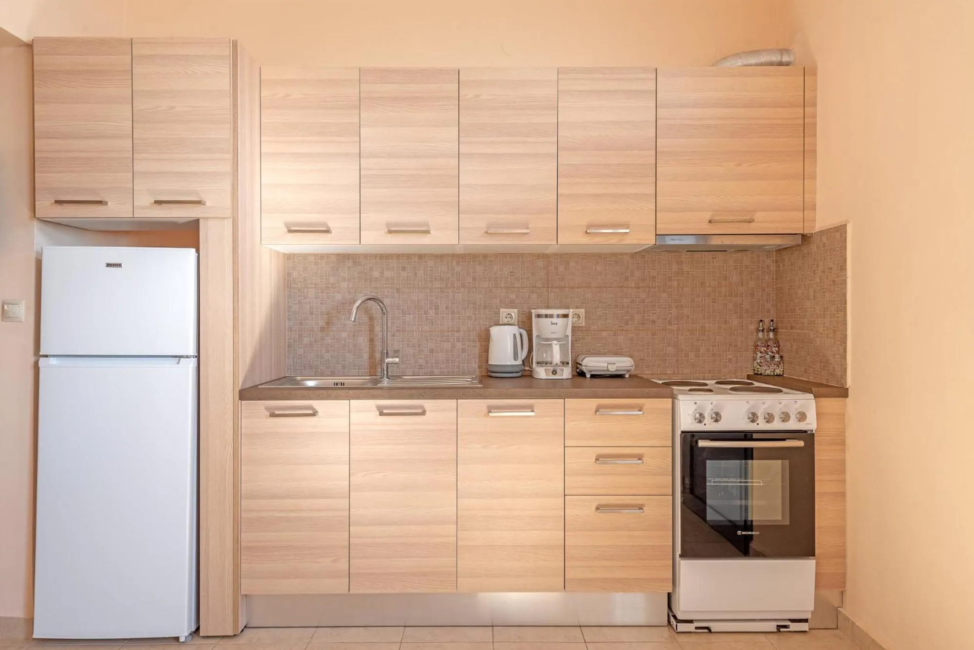 Kitchen or kitchenette in Akrogiali Studios