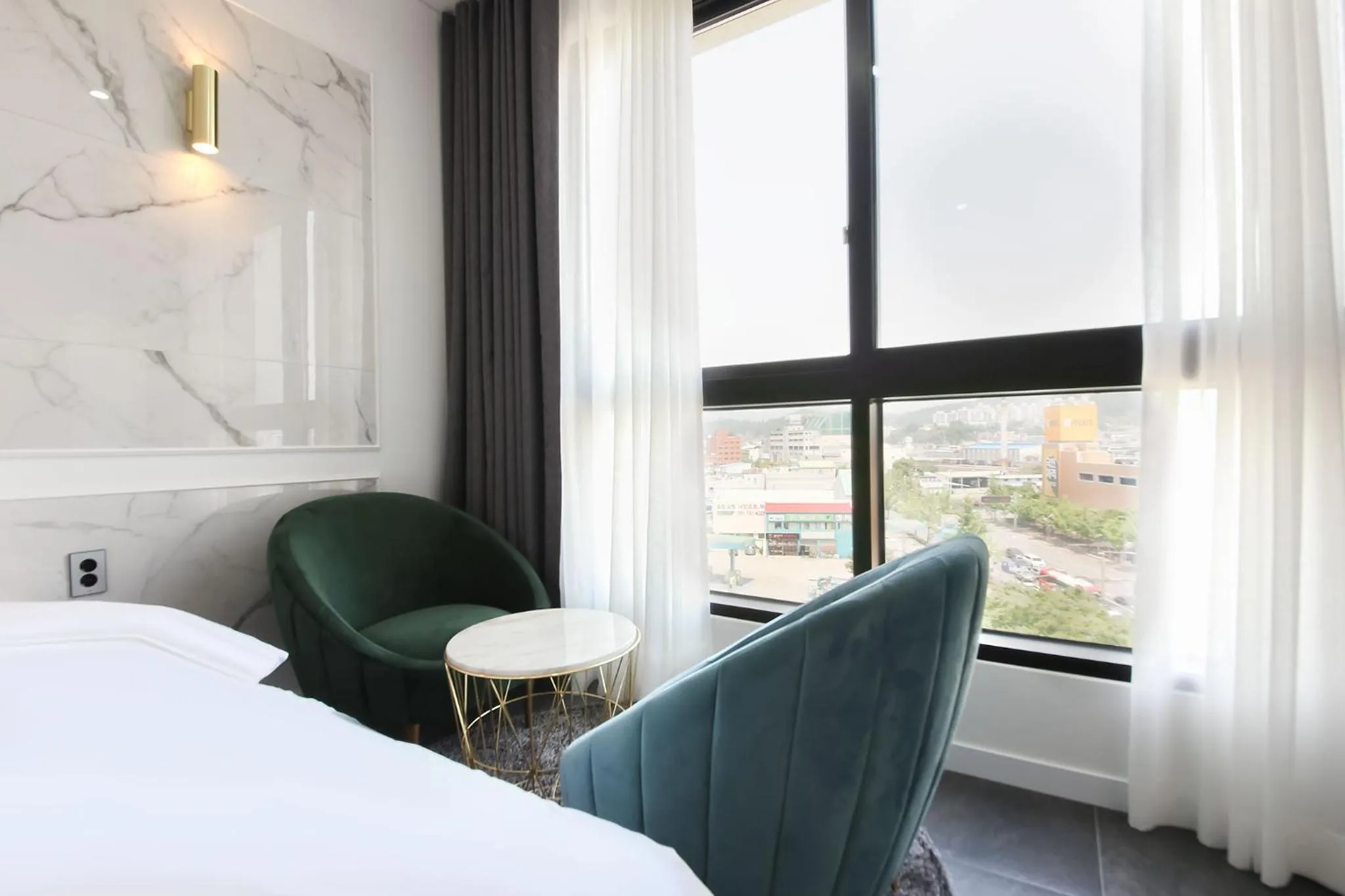 Bed in Hotel Raum Suncheon