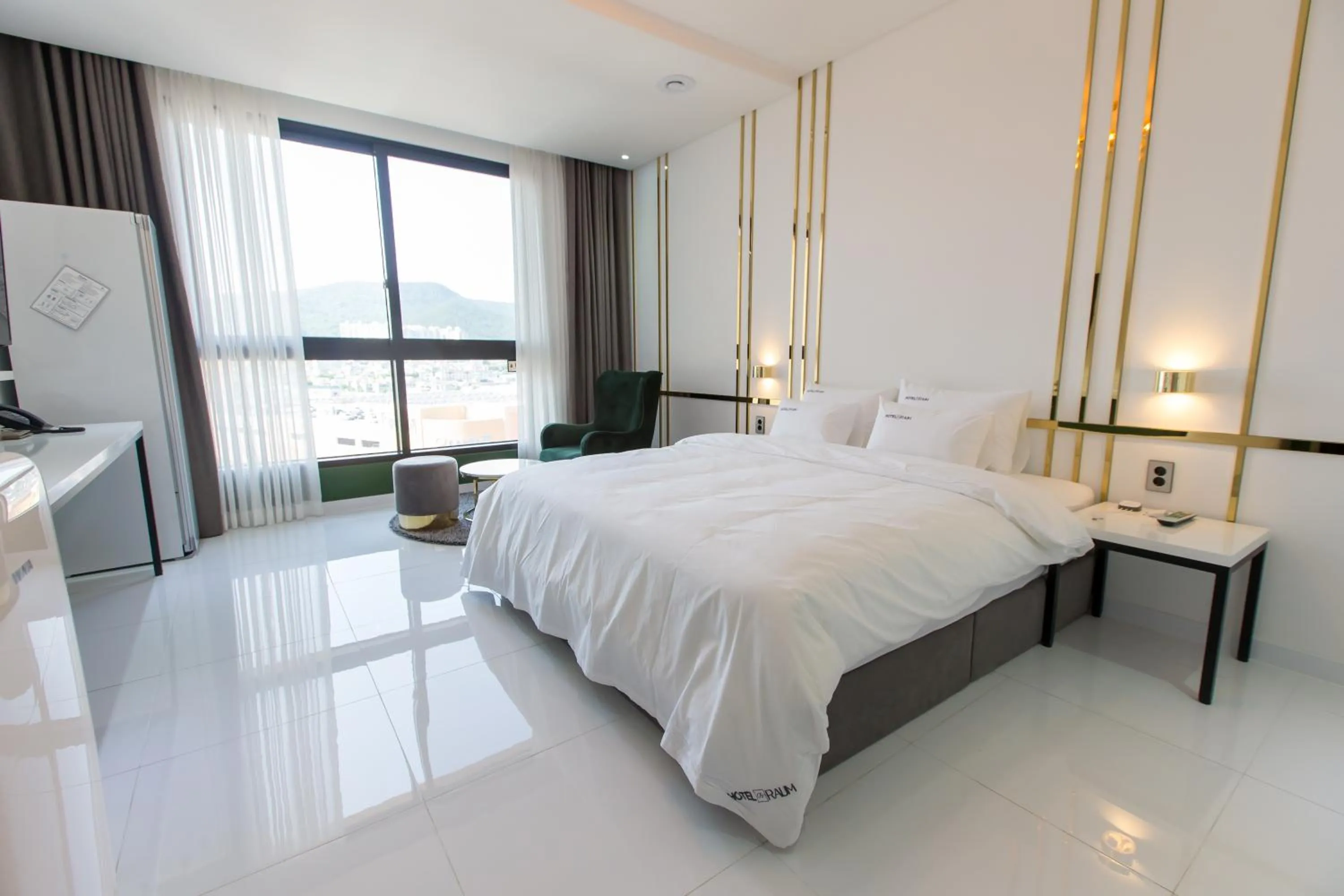 Bed in Hotel Raum Suncheon