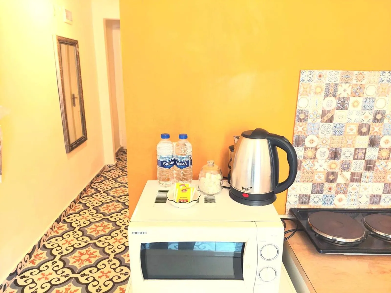 Kitchen or kitchenette in La bella hotel