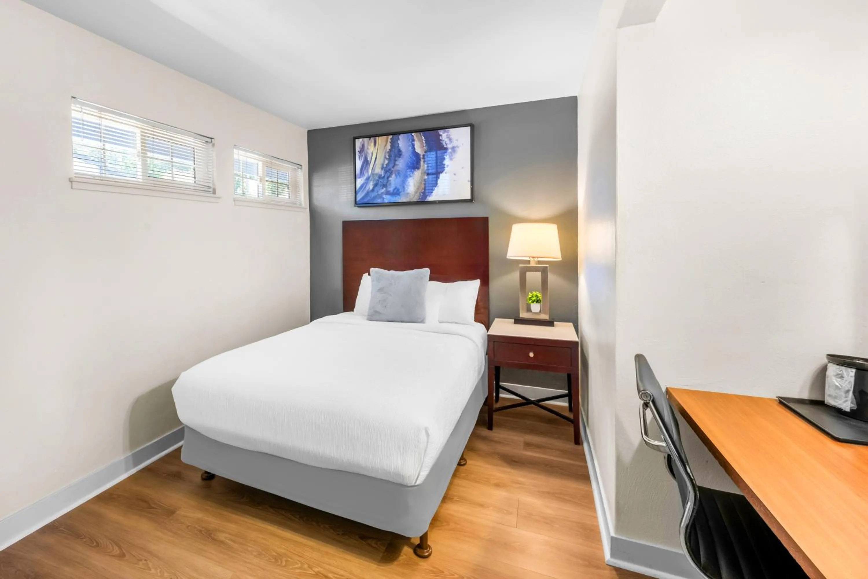 Bed in Quality Inn & Suites