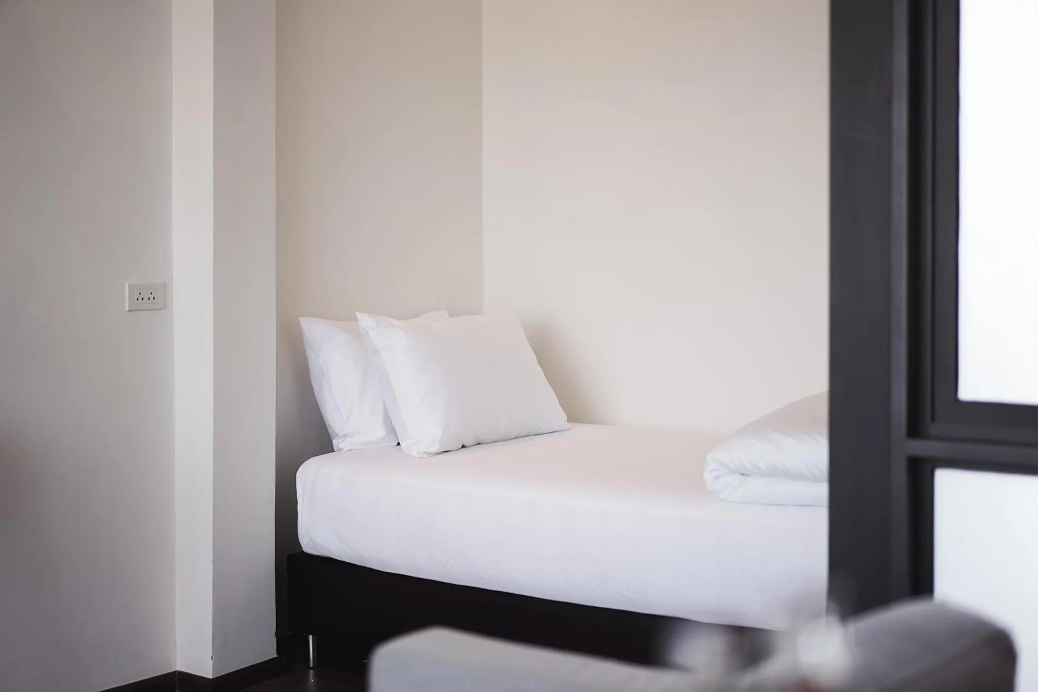 Bed in Wonderwall Hotel