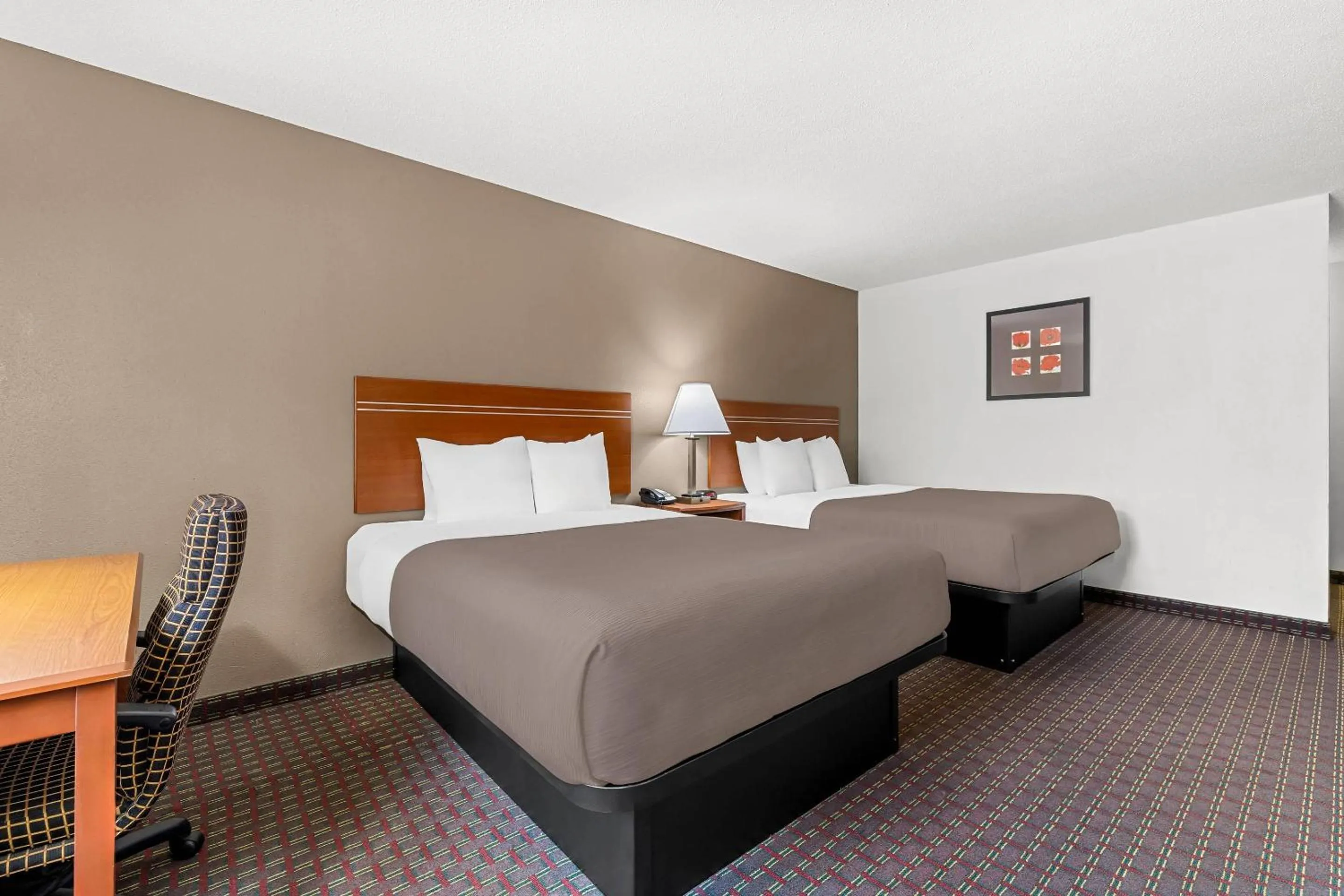 Bedroom, Bed in Rodeway Inn Rapid City North