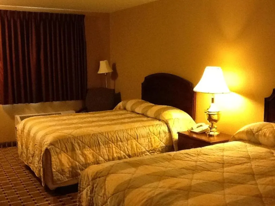 Bed in Caronoda Motel