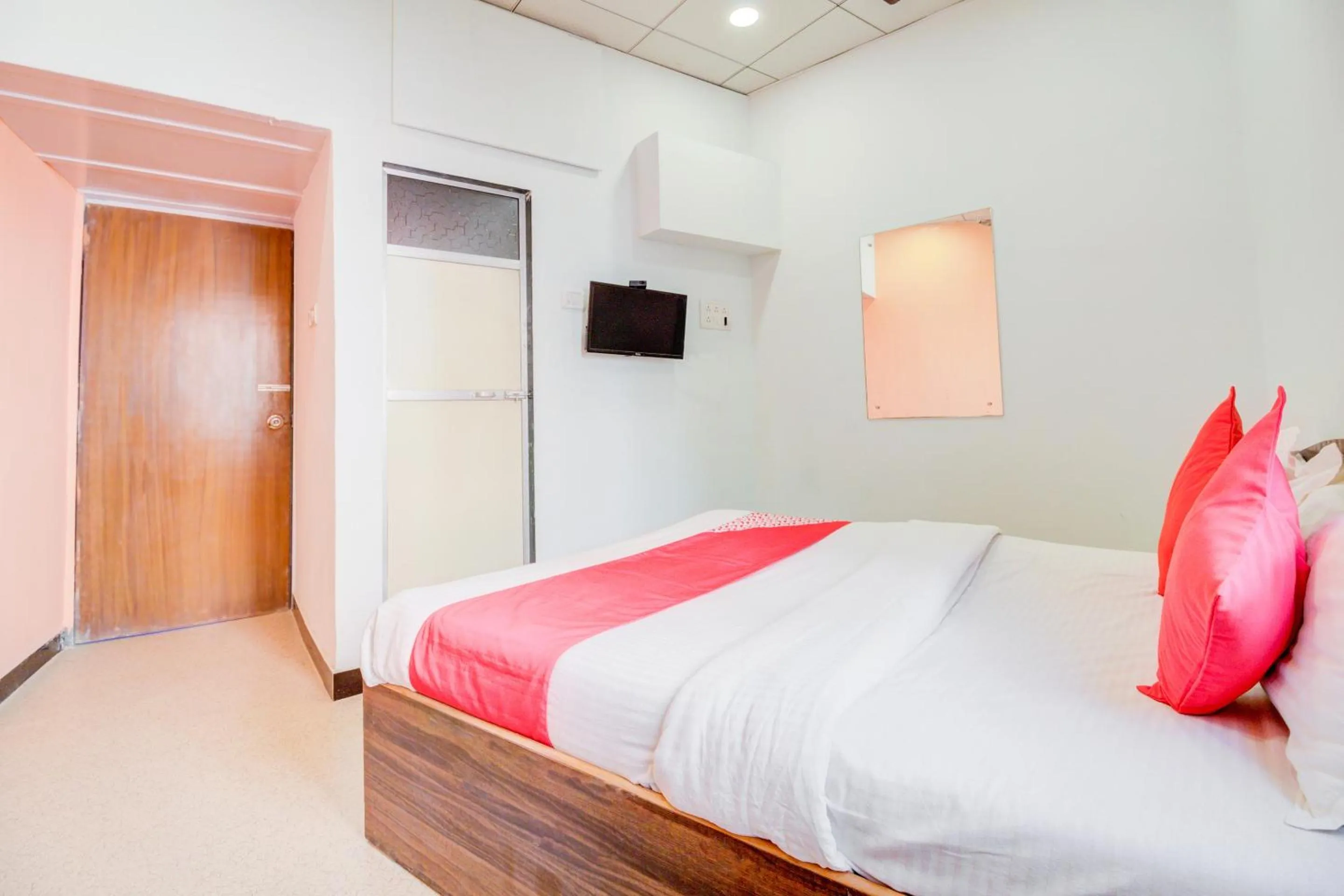 Bedroom, Bed in Super Hotel O Anjali Hotel