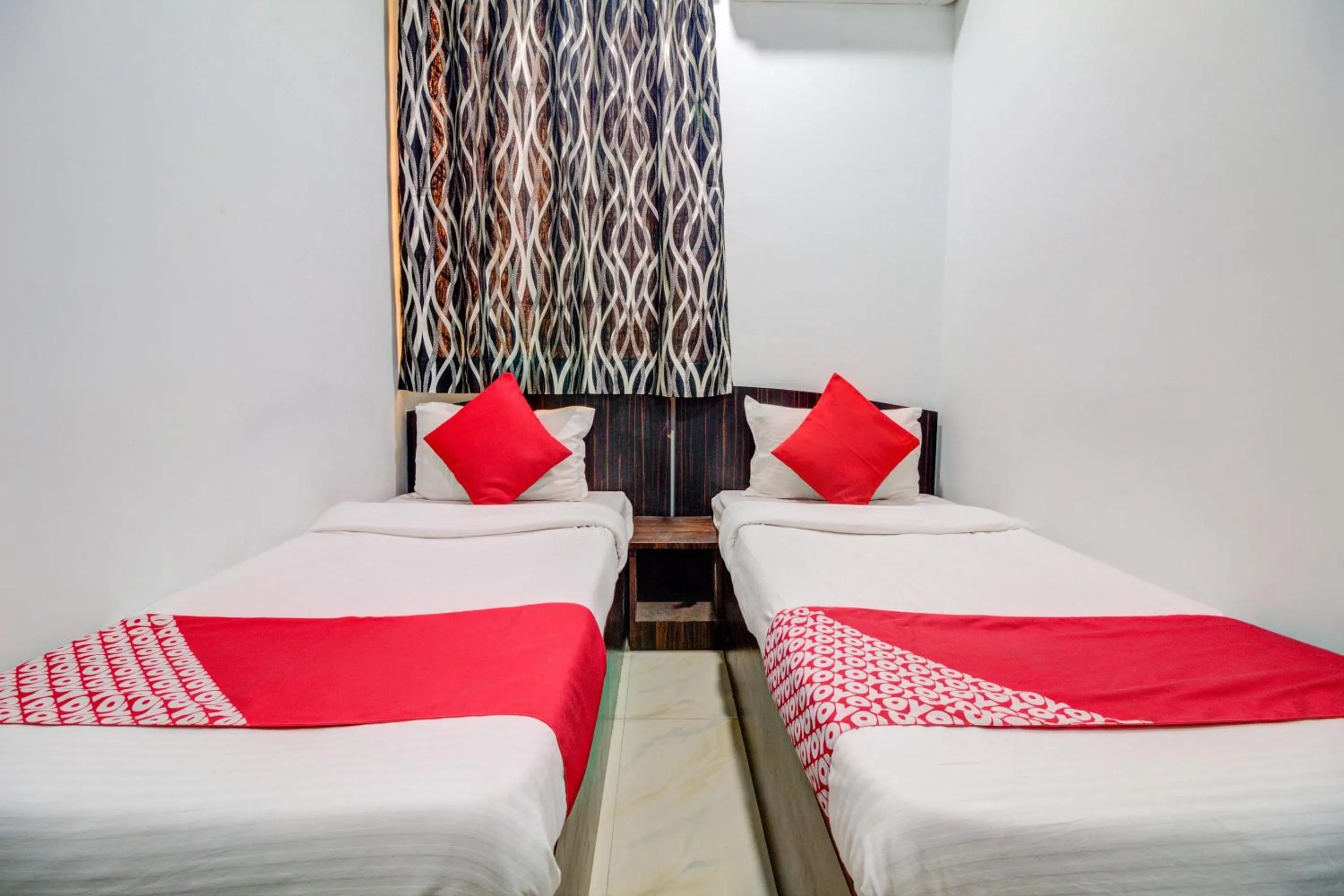 Bedroom, Bed in Super Hotel O Anjali Hotel