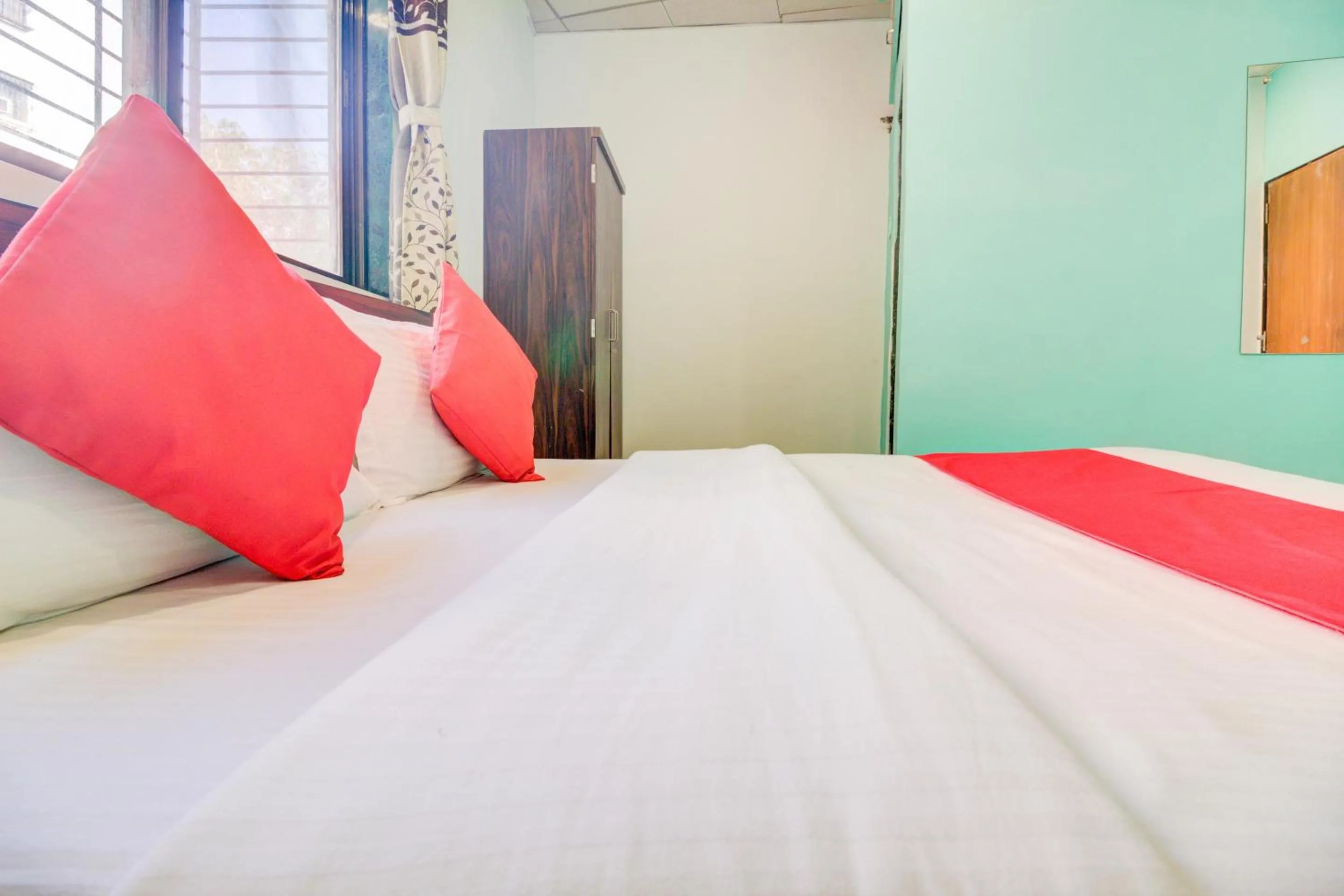 Bedroom, Bed in Super Hotel O Anjali Hotel