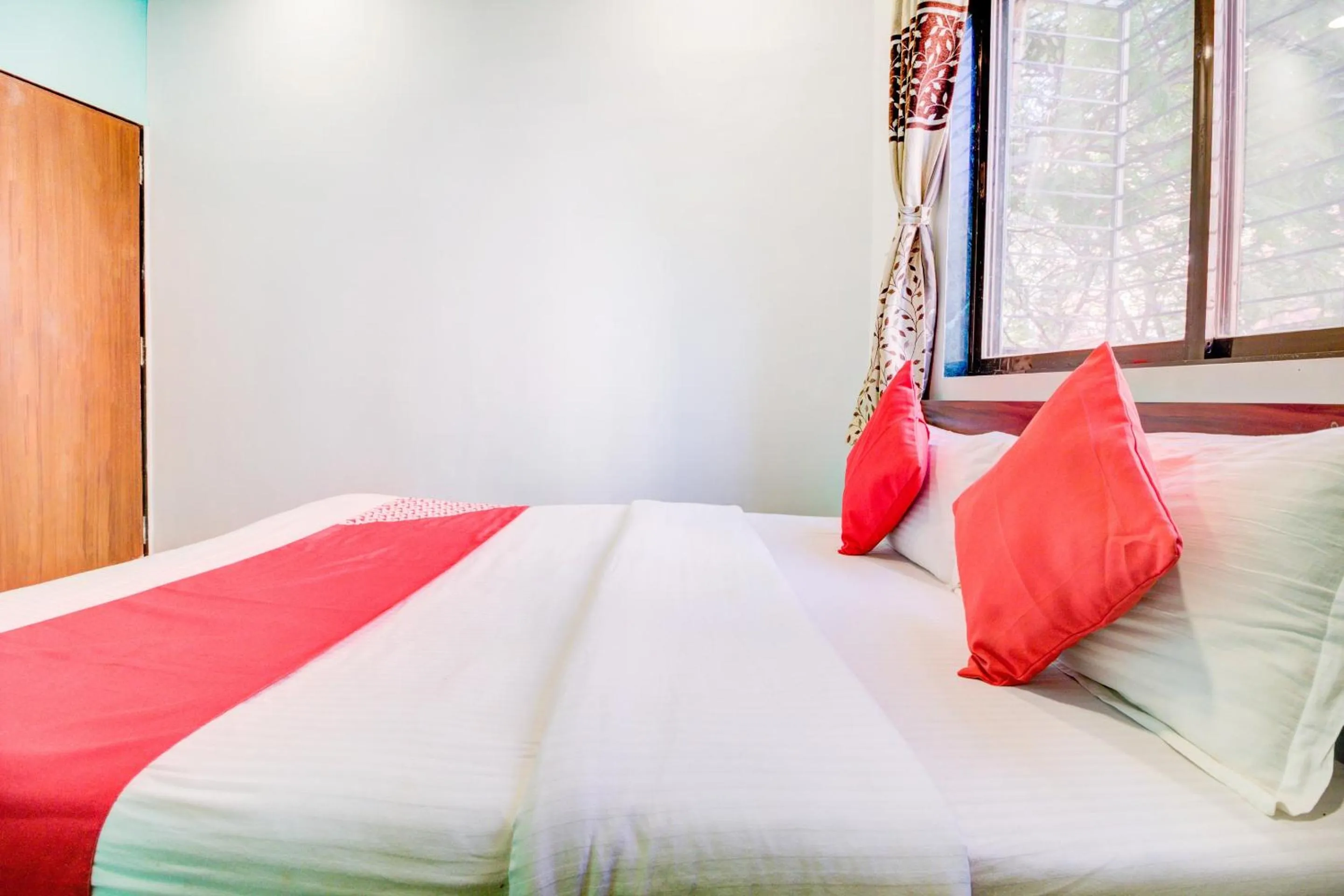 Bedroom, Bed in Super Hotel O Anjali Hotel