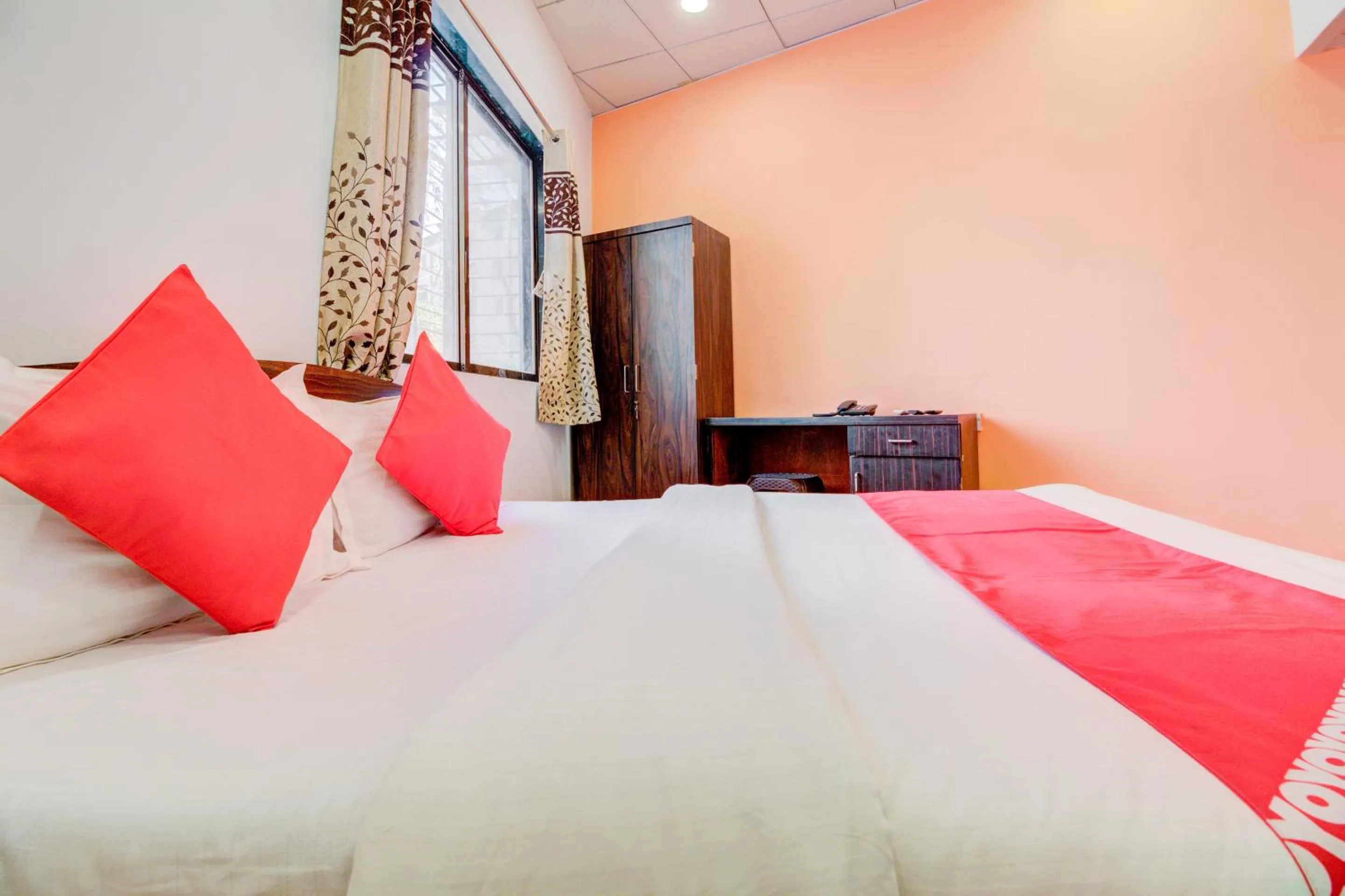 Bedroom, Bed in Super Hotel O Anjali Hotel