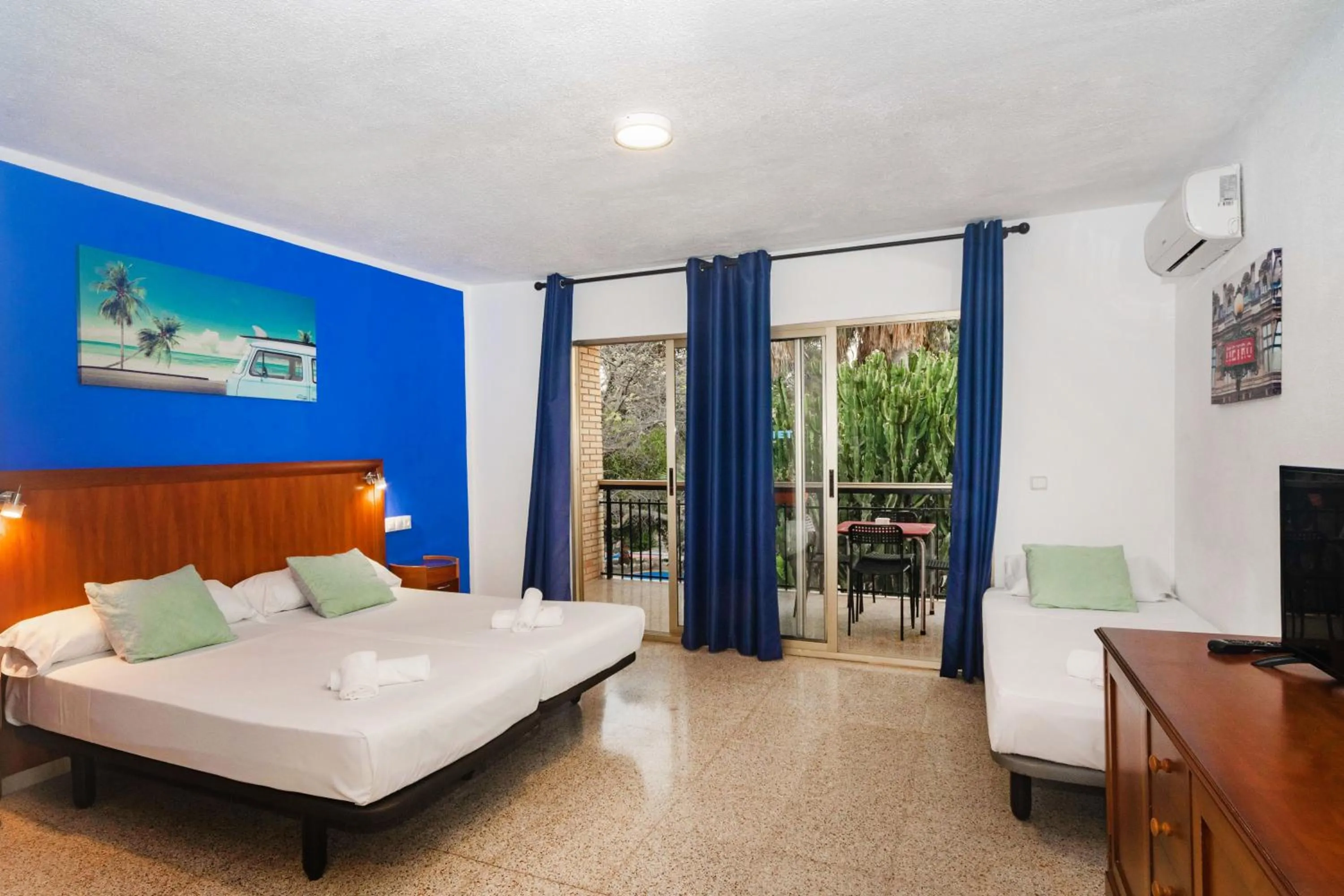 Bed in APARTAMENTOS PALASIET