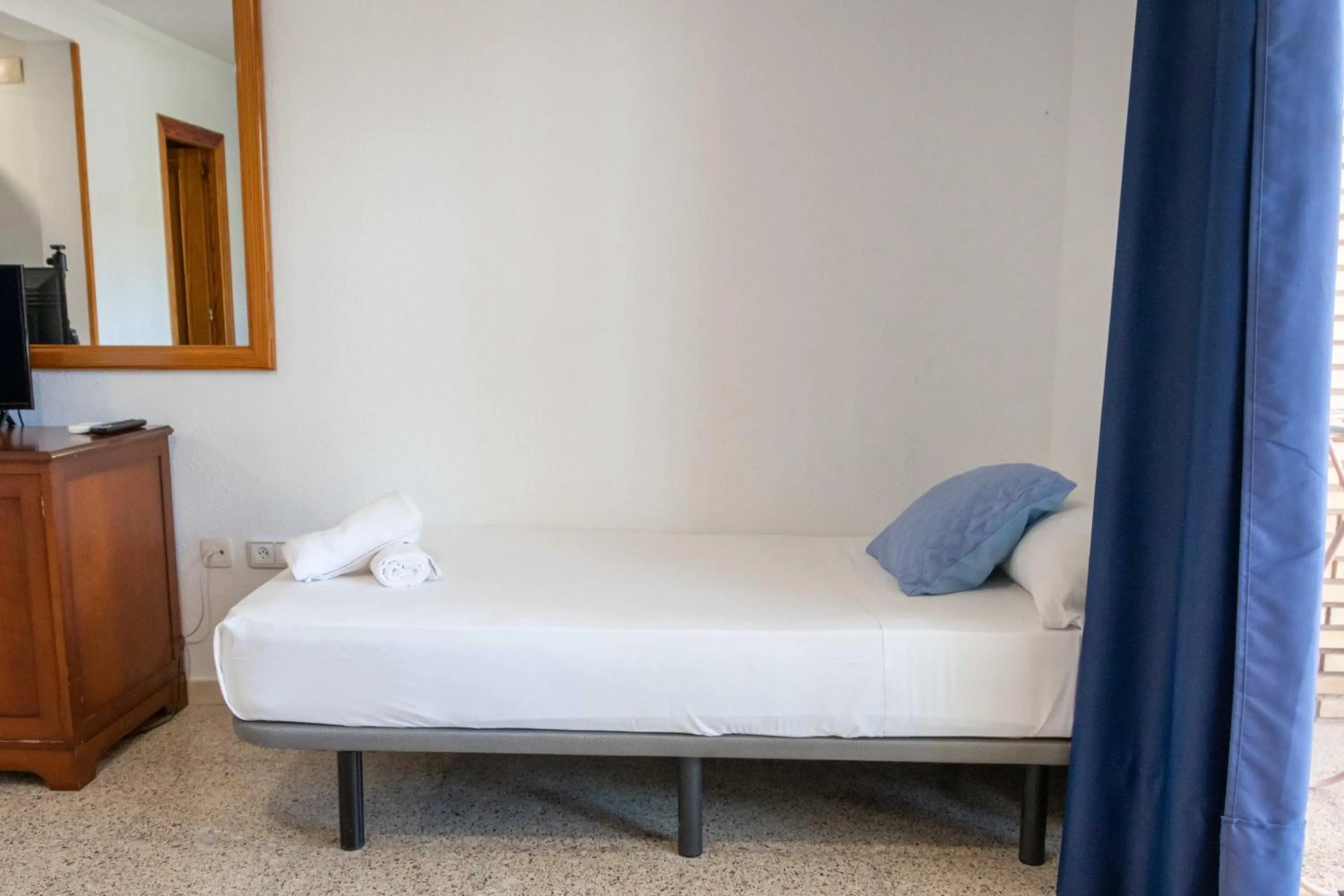 Bed in APARTAMENTOS PALASIET