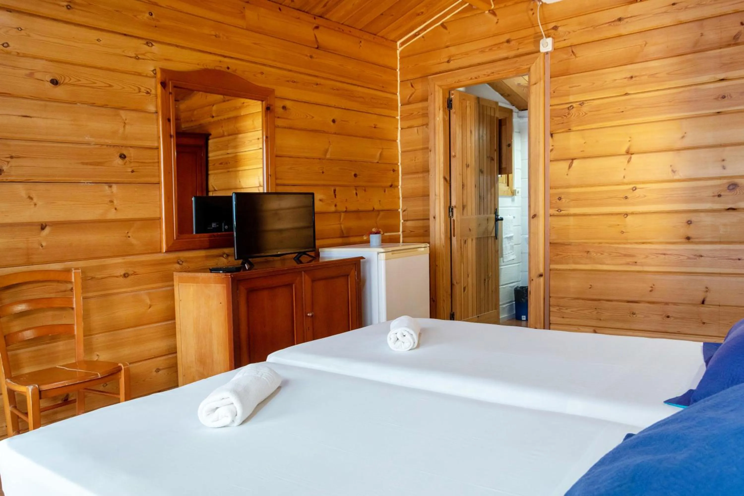 Bed in APARTAMENTOS PALASIET