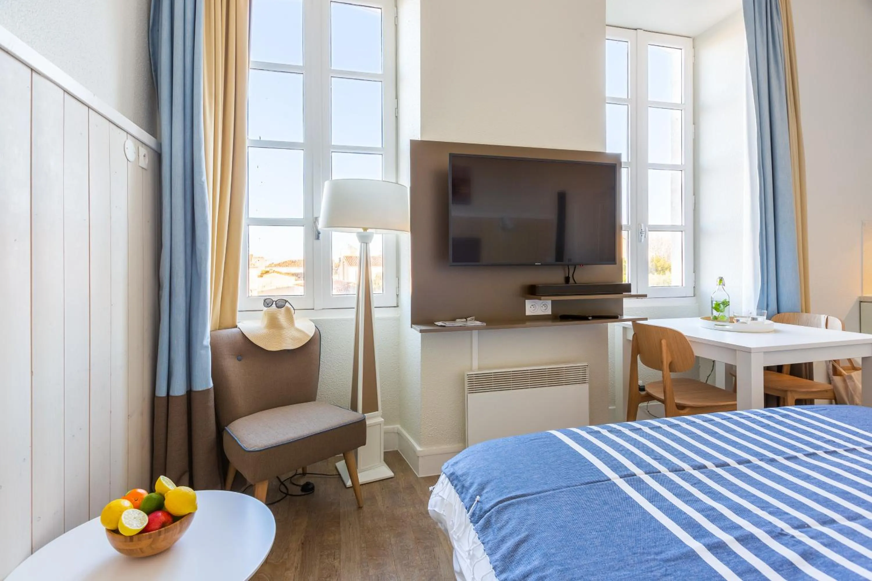 Communal lounge/ TV room, Bed in Résidence Pierre & Vacances Le Palais des Gouverneurs