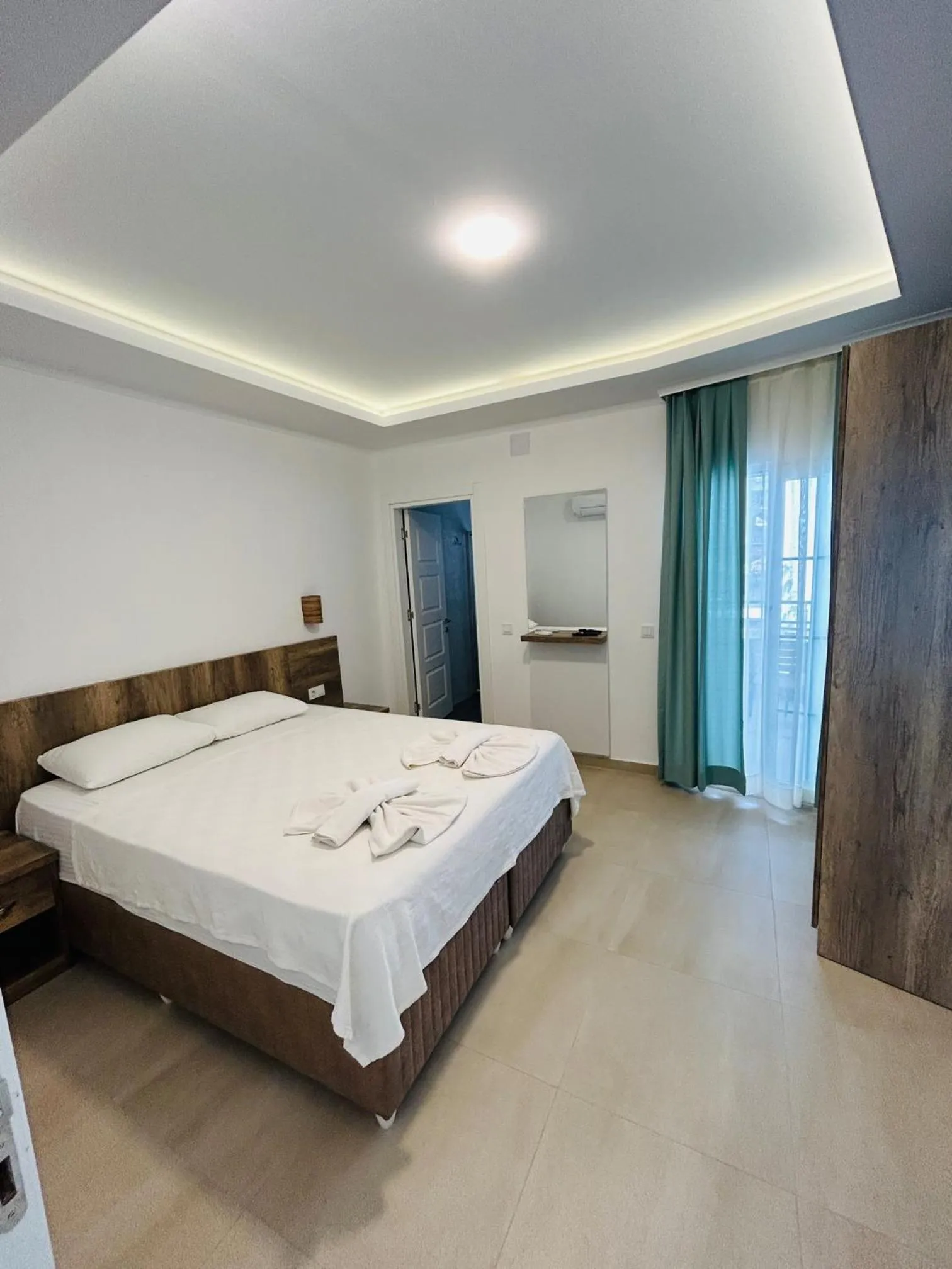 Photo of the whole room, Bed in dekatria rooms&aparts