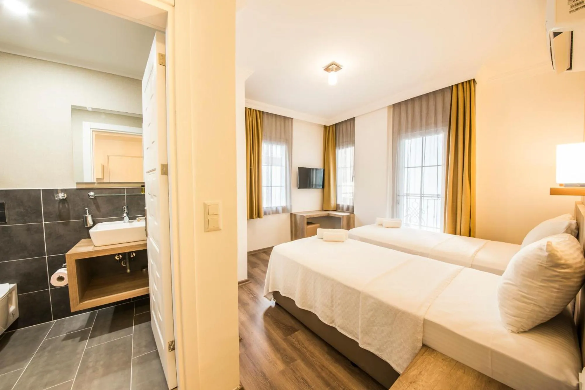 Photo of the whole room, Bed in dekatria rooms&aparts