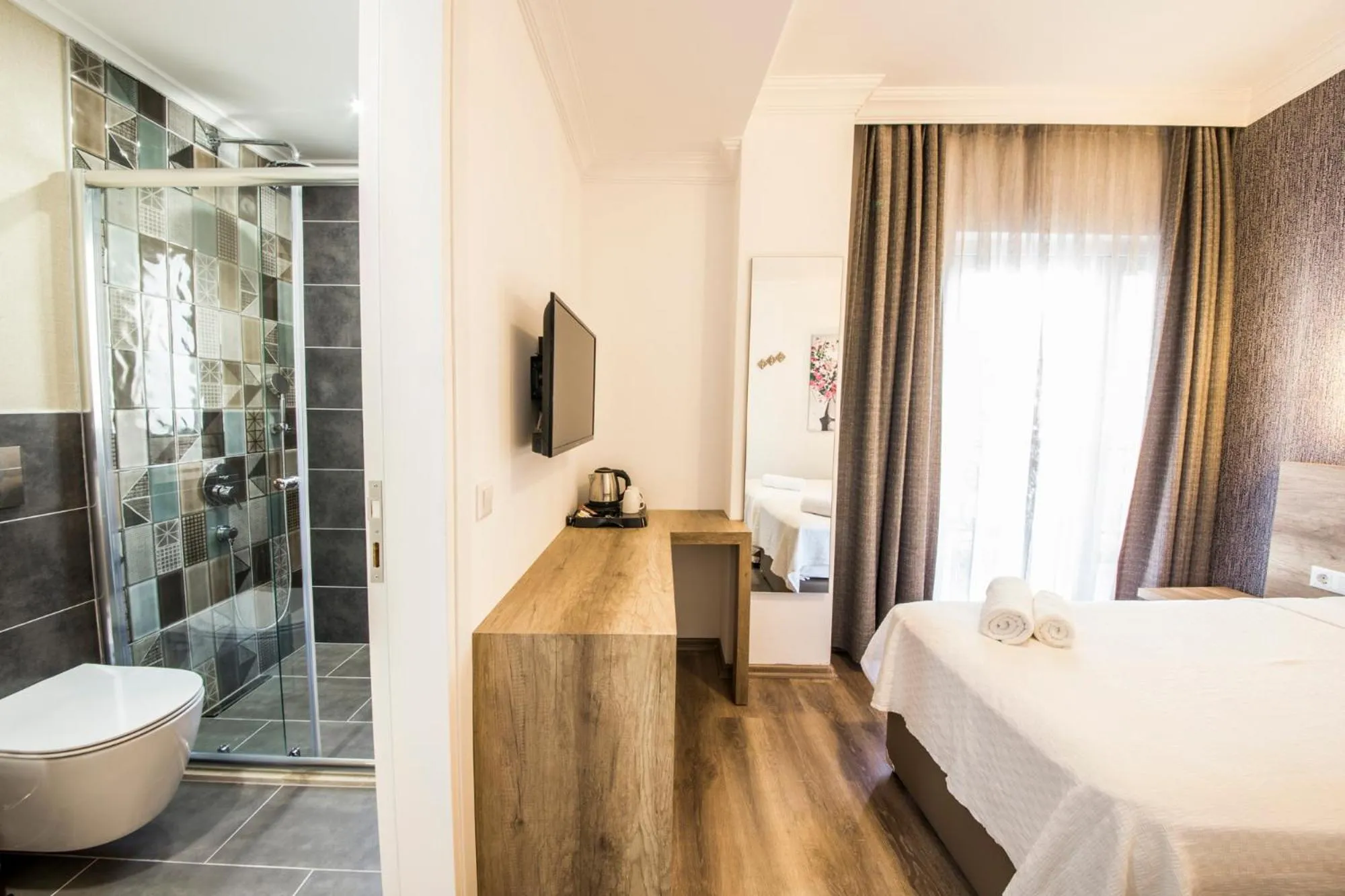 Photo of the whole room, Bed in dekatria rooms&aparts