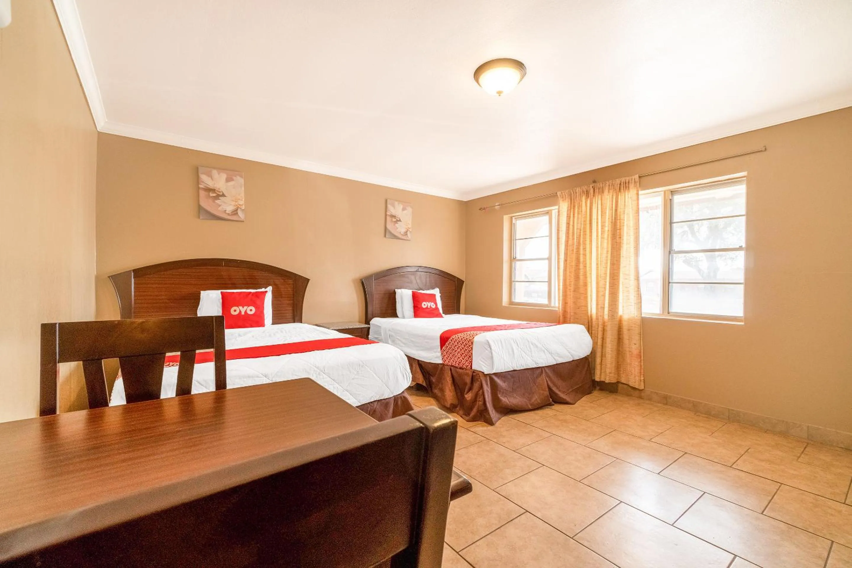 Bedroom in Capital O Hotel Beeville -US 181