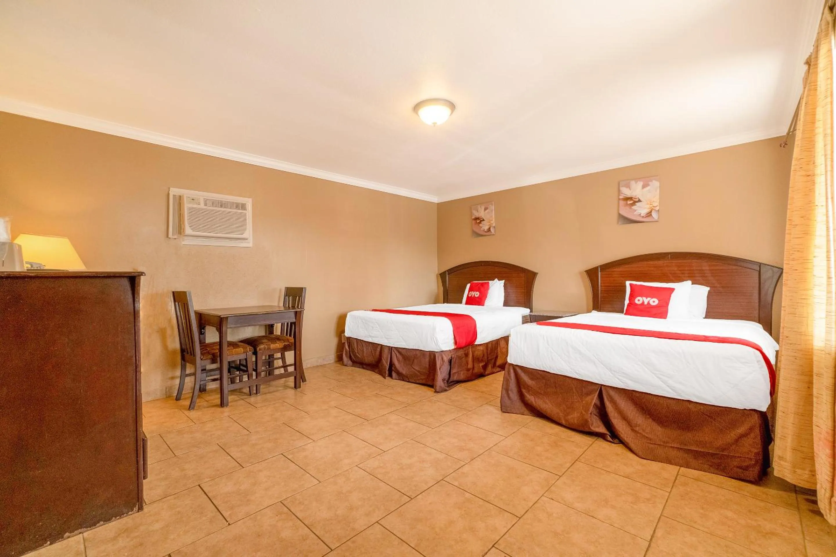 Bedroom in Capital O Hotel Beeville -US 181