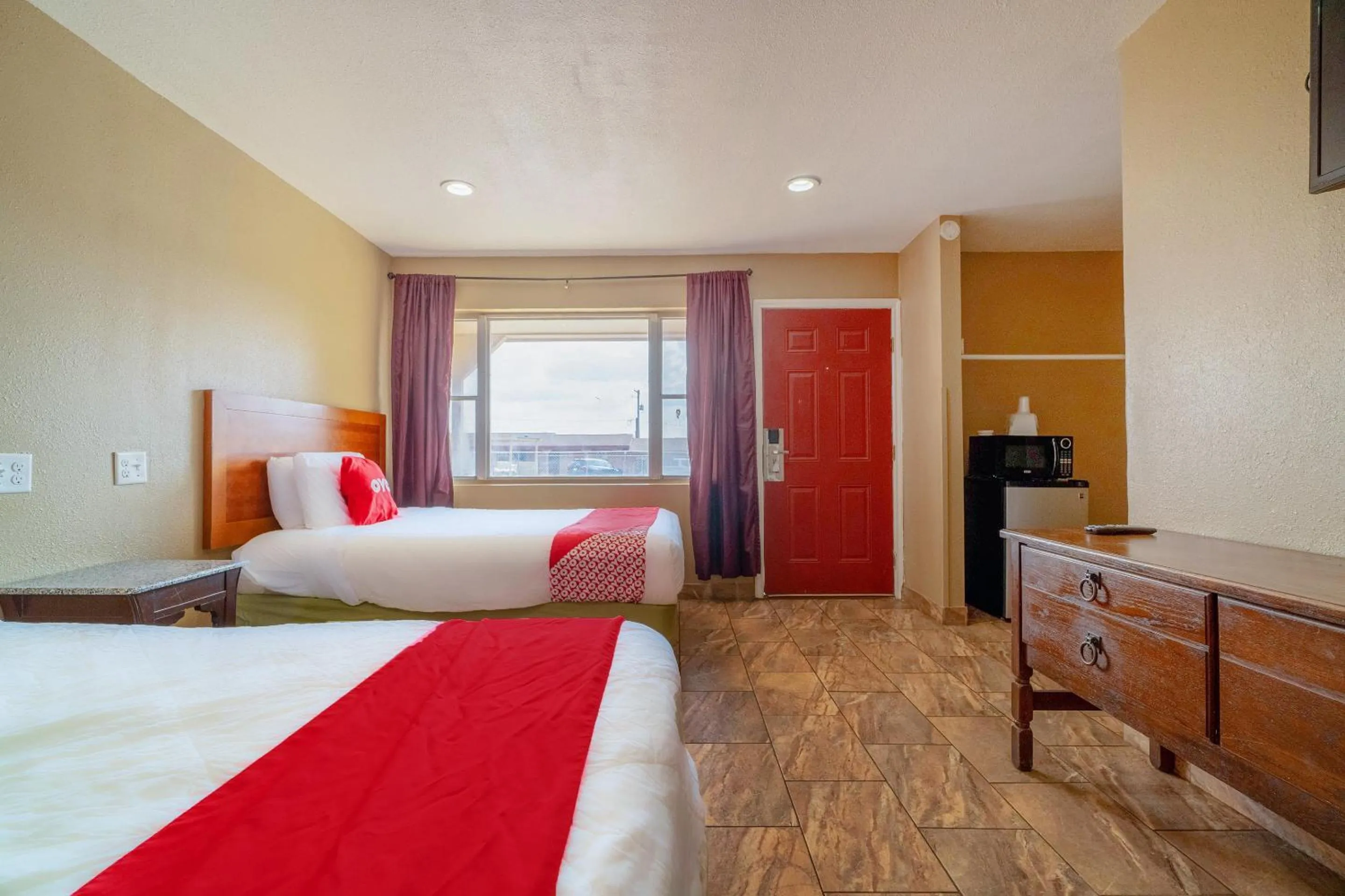 Bedroom in Capital O Hotel Beeville -US 181