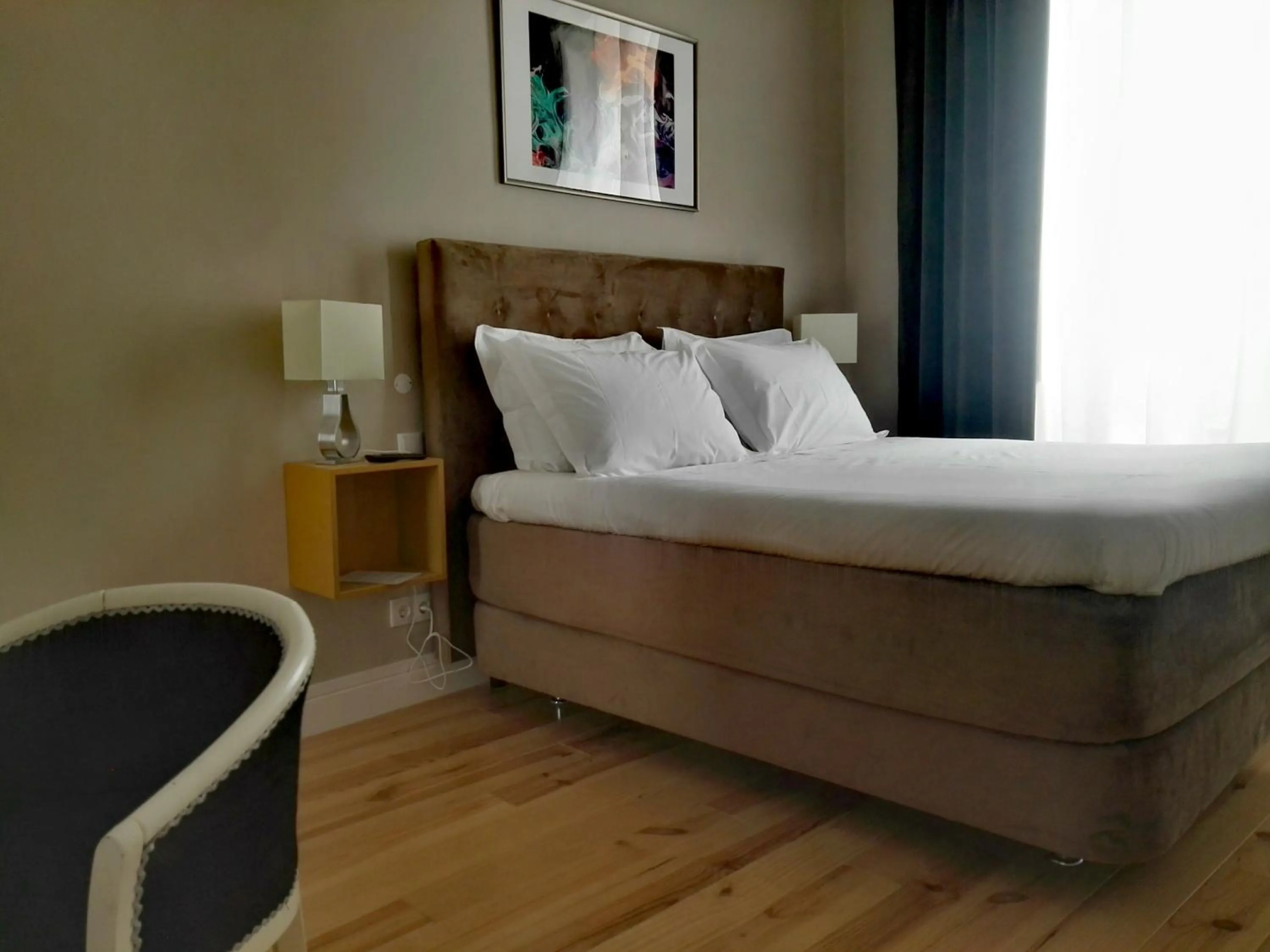 Bed in Temple Suites Guesthouse