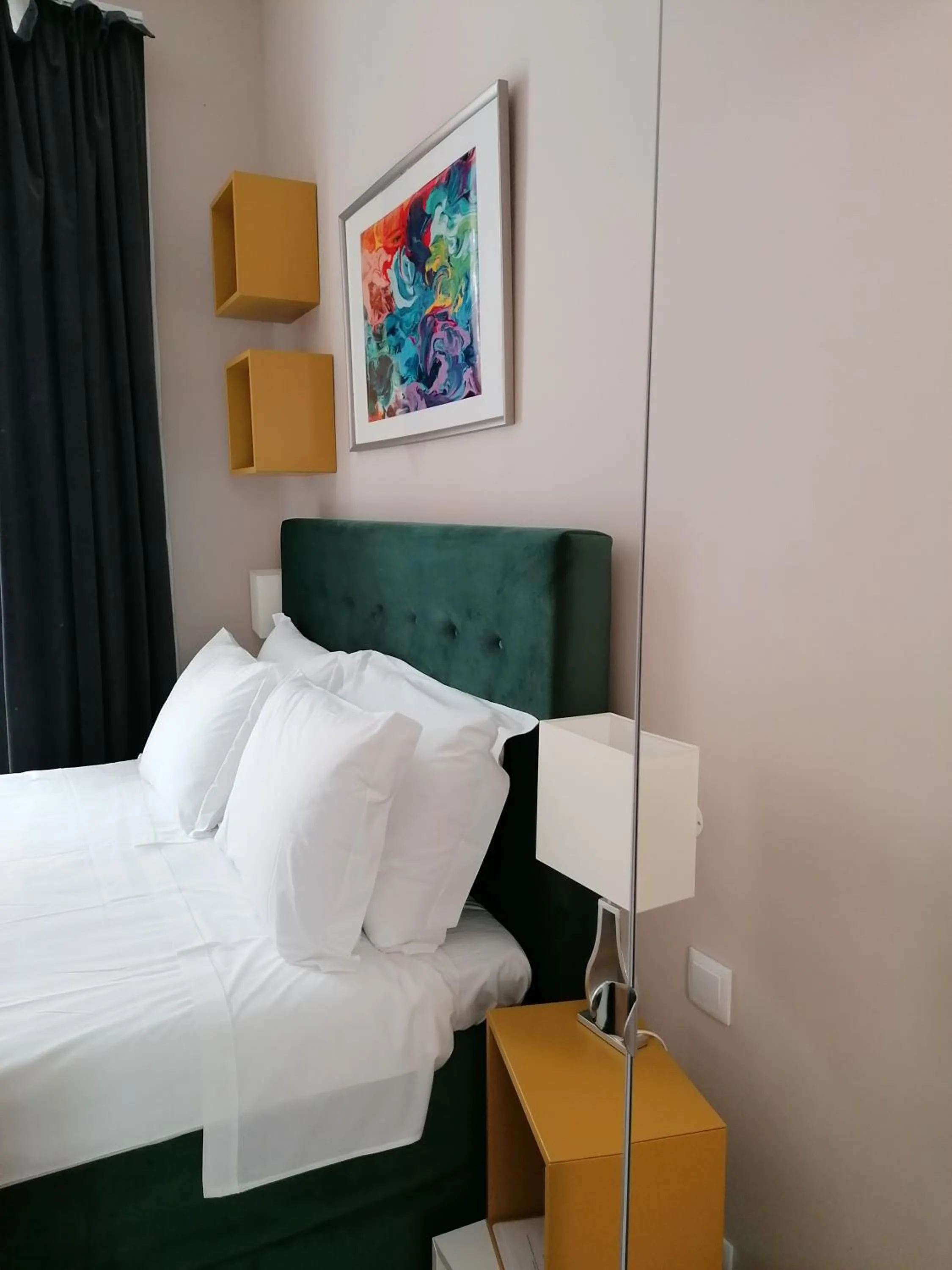 Bed in Temple Suites Guesthouse