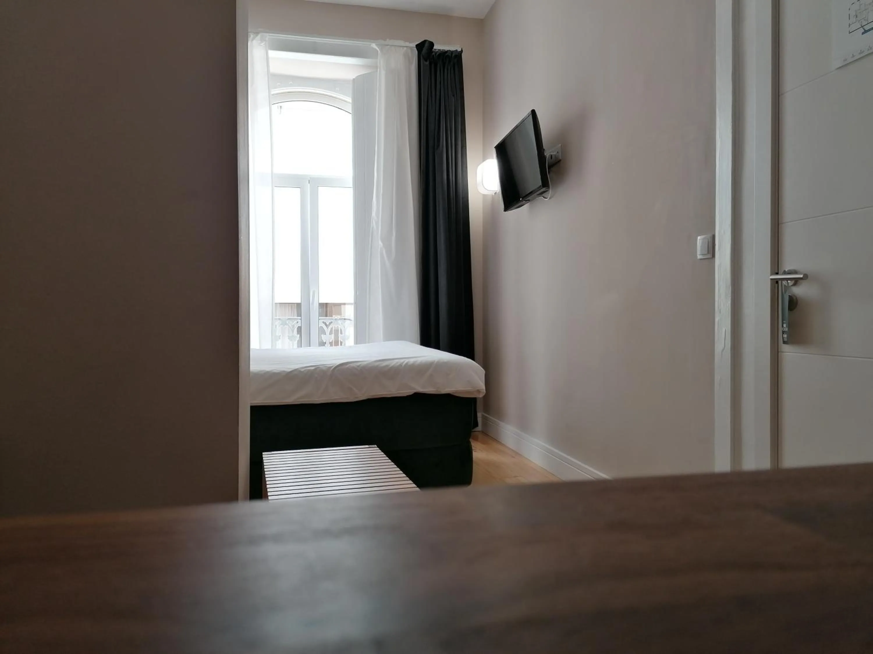 Bed in Temple Suites Guesthouse