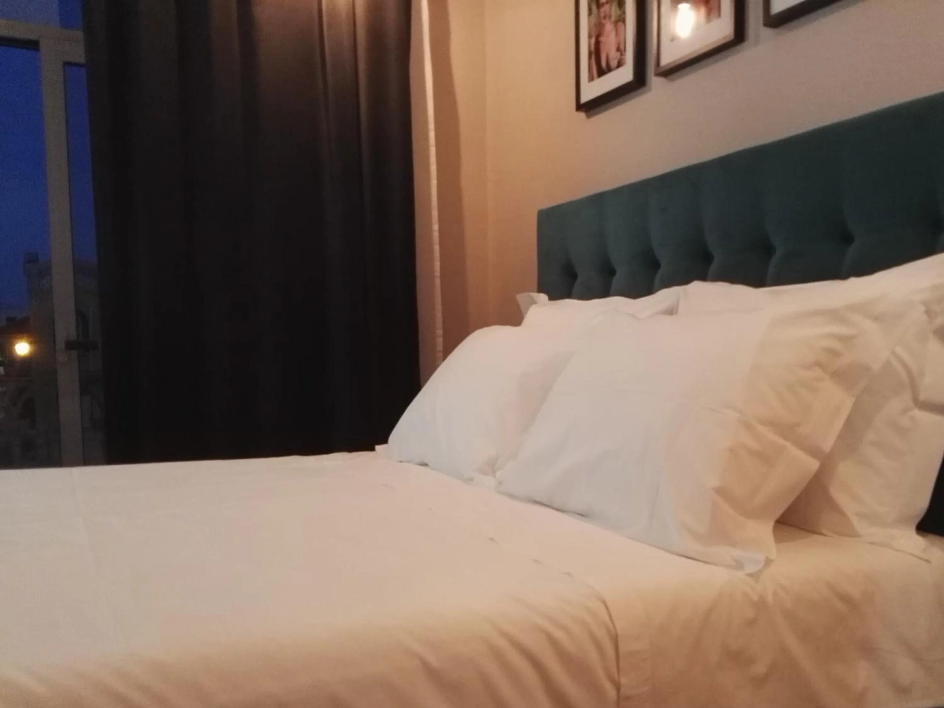 Bed in Temple Suites Guesthouse