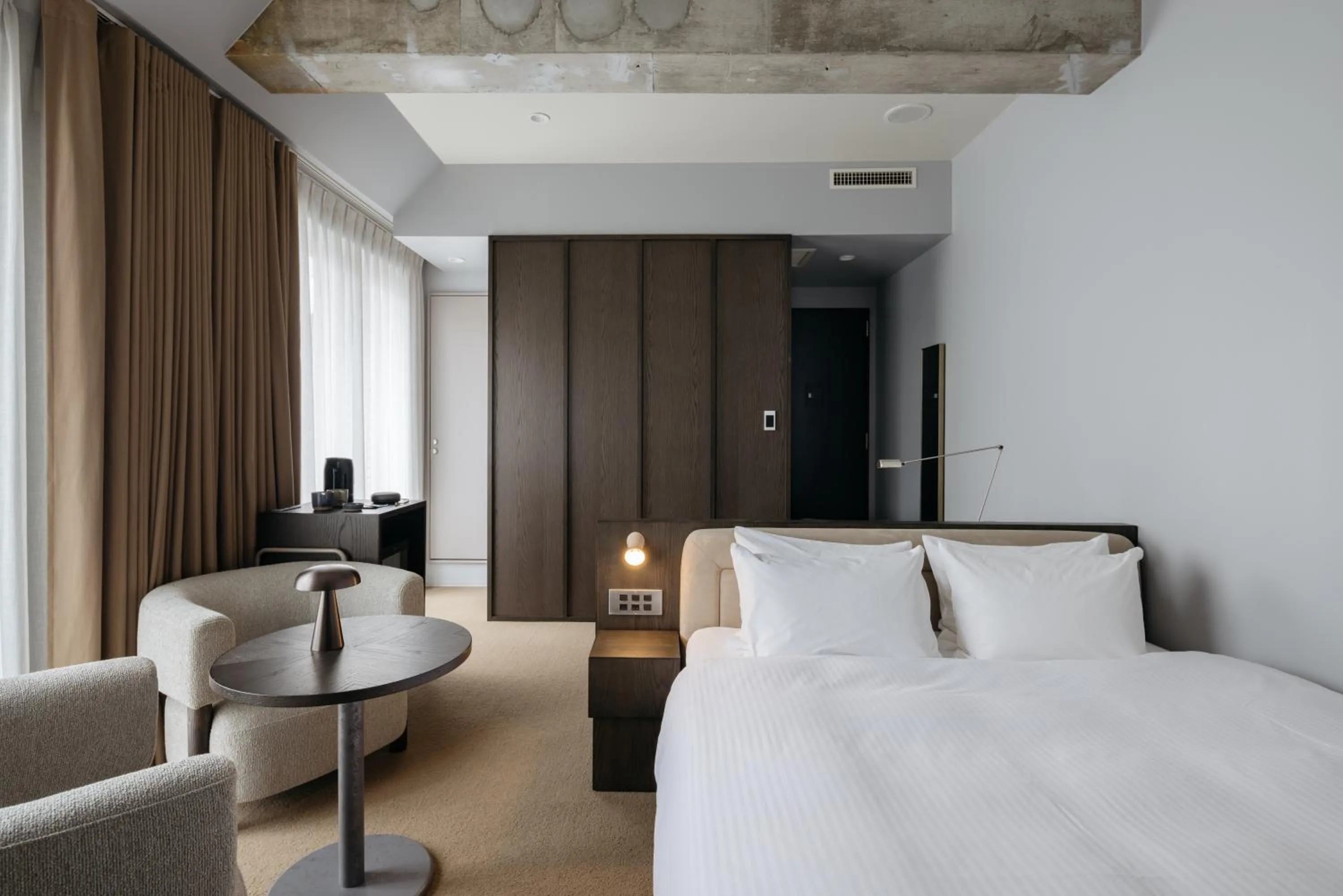 Photo of the whole room, Bed in KIRO Hiroshima by THE SHARE HOTELS