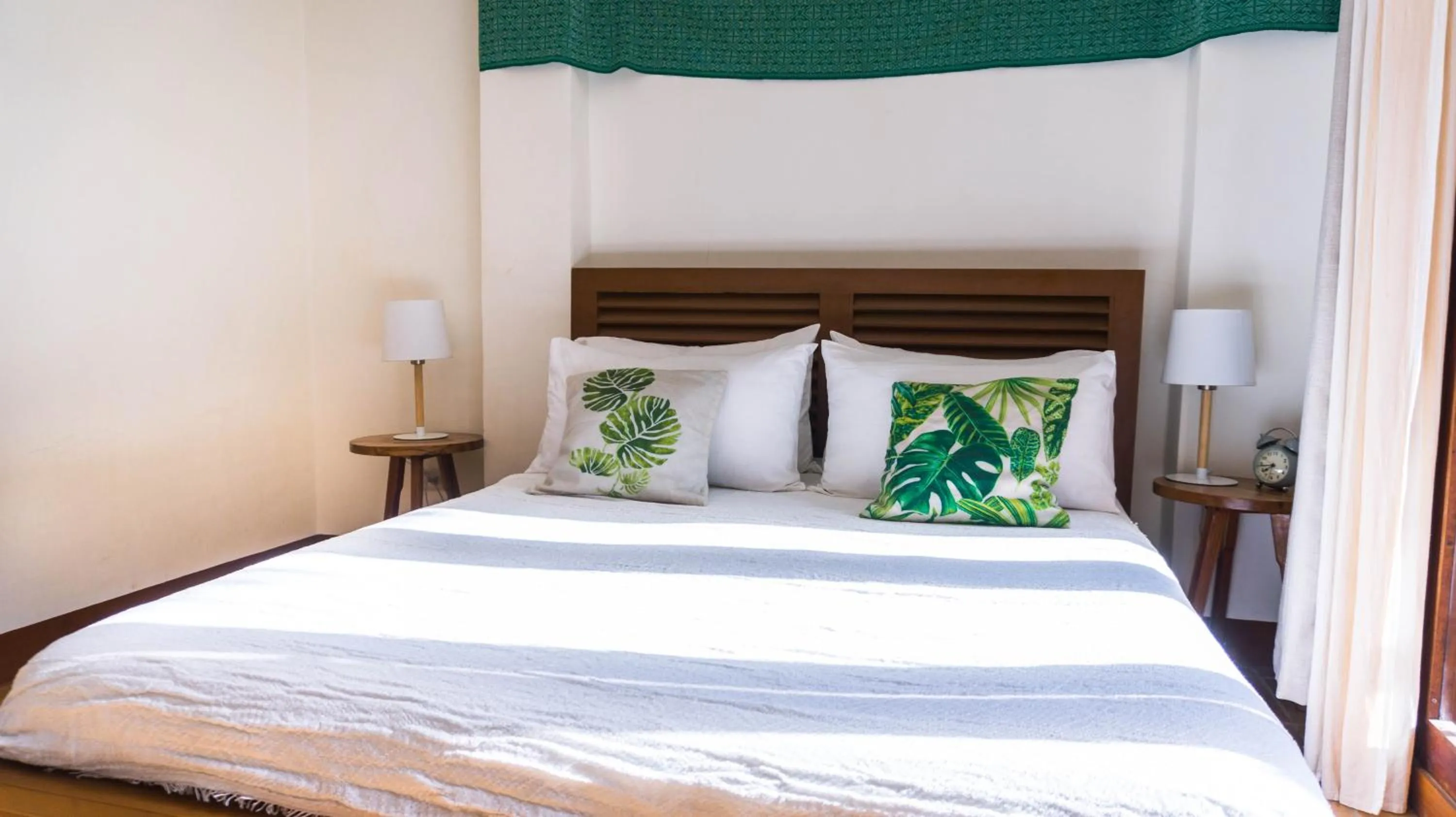 Bed in Talisay Boutique Hotel