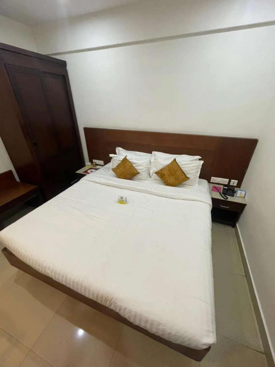 Bed in Kallada Sangeetha Hotels
