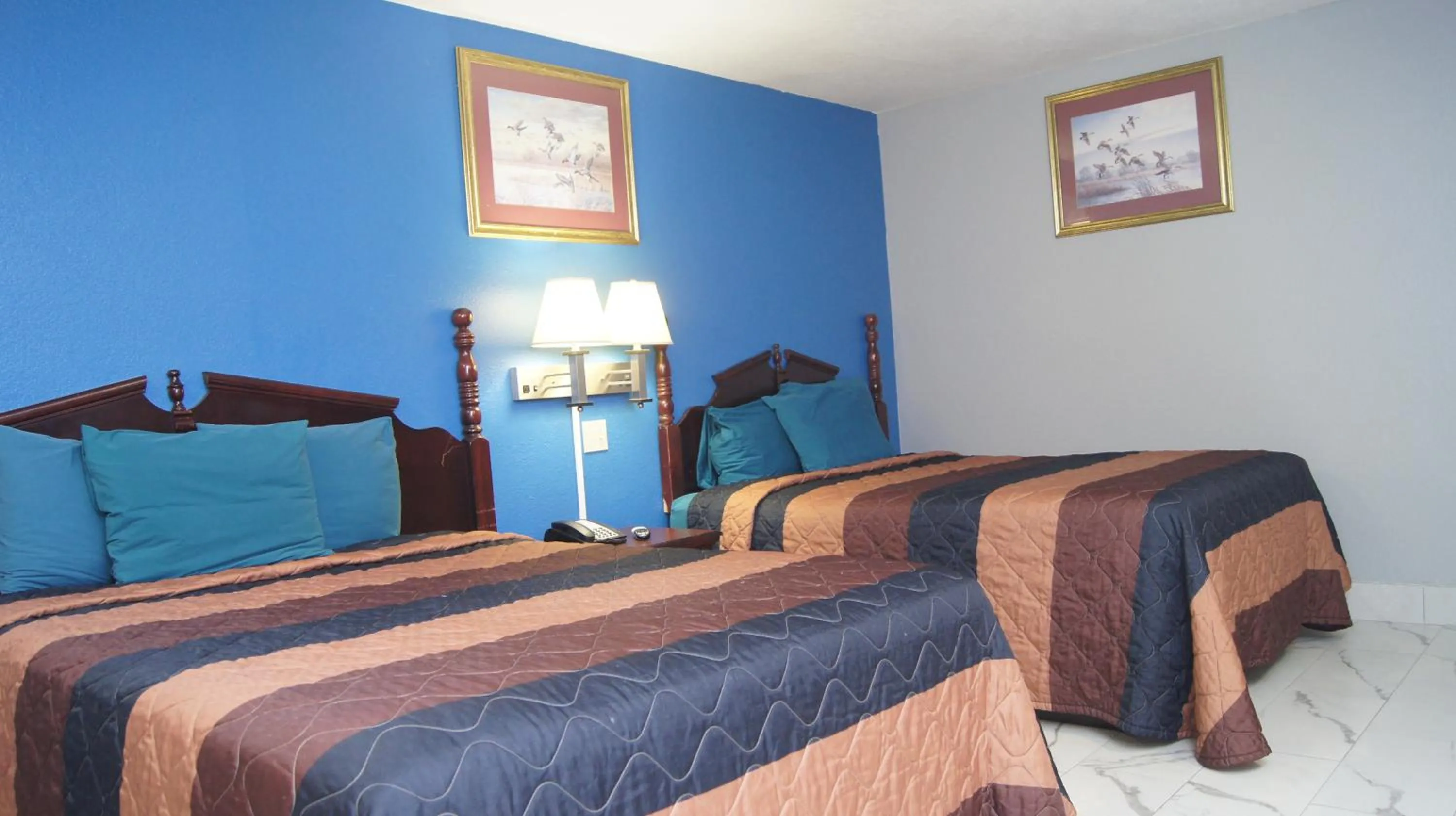 Bedroom in Holiday Lodge & Suites