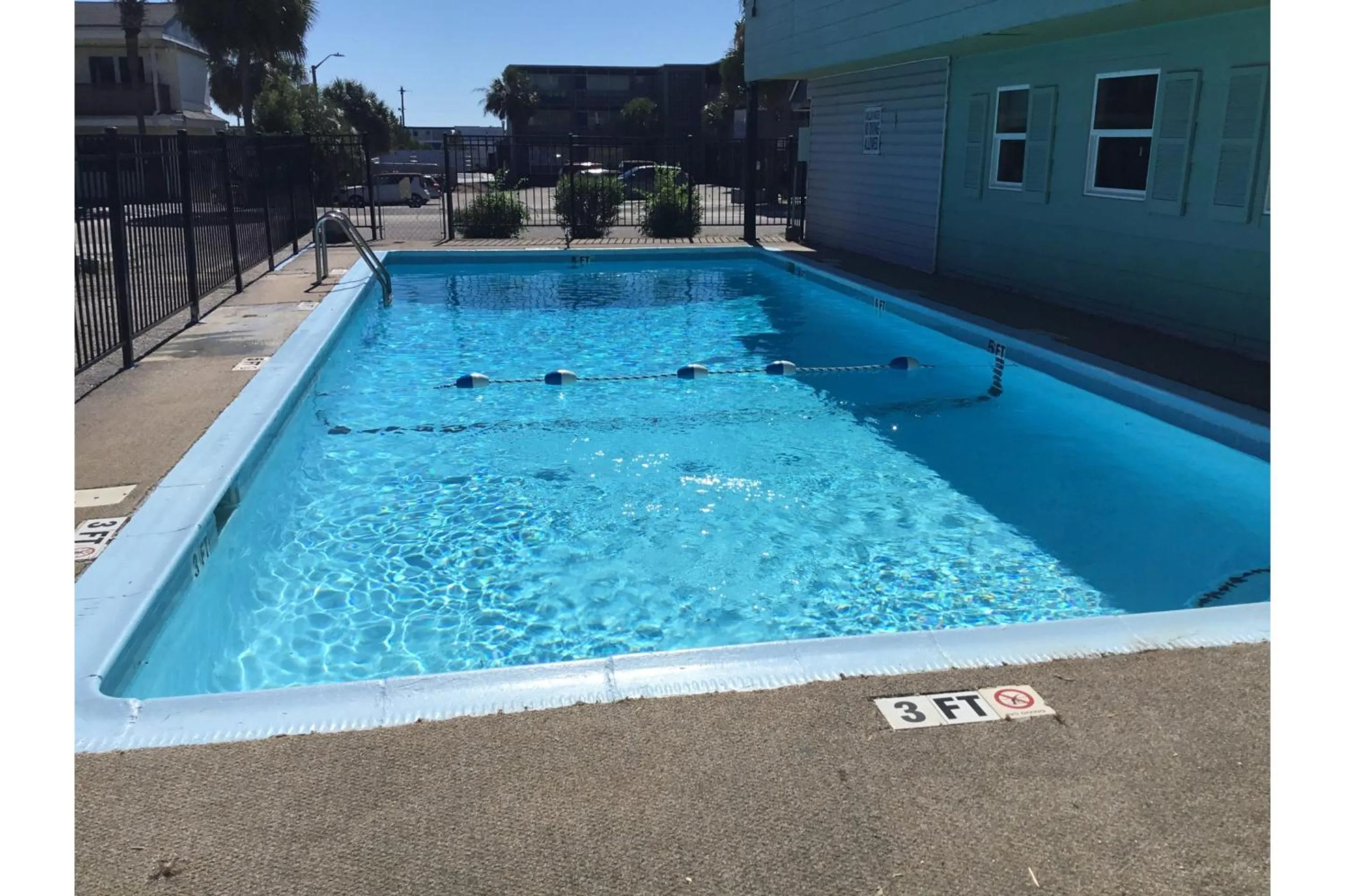 Swimming pool in Crepe Myrtle by OYO