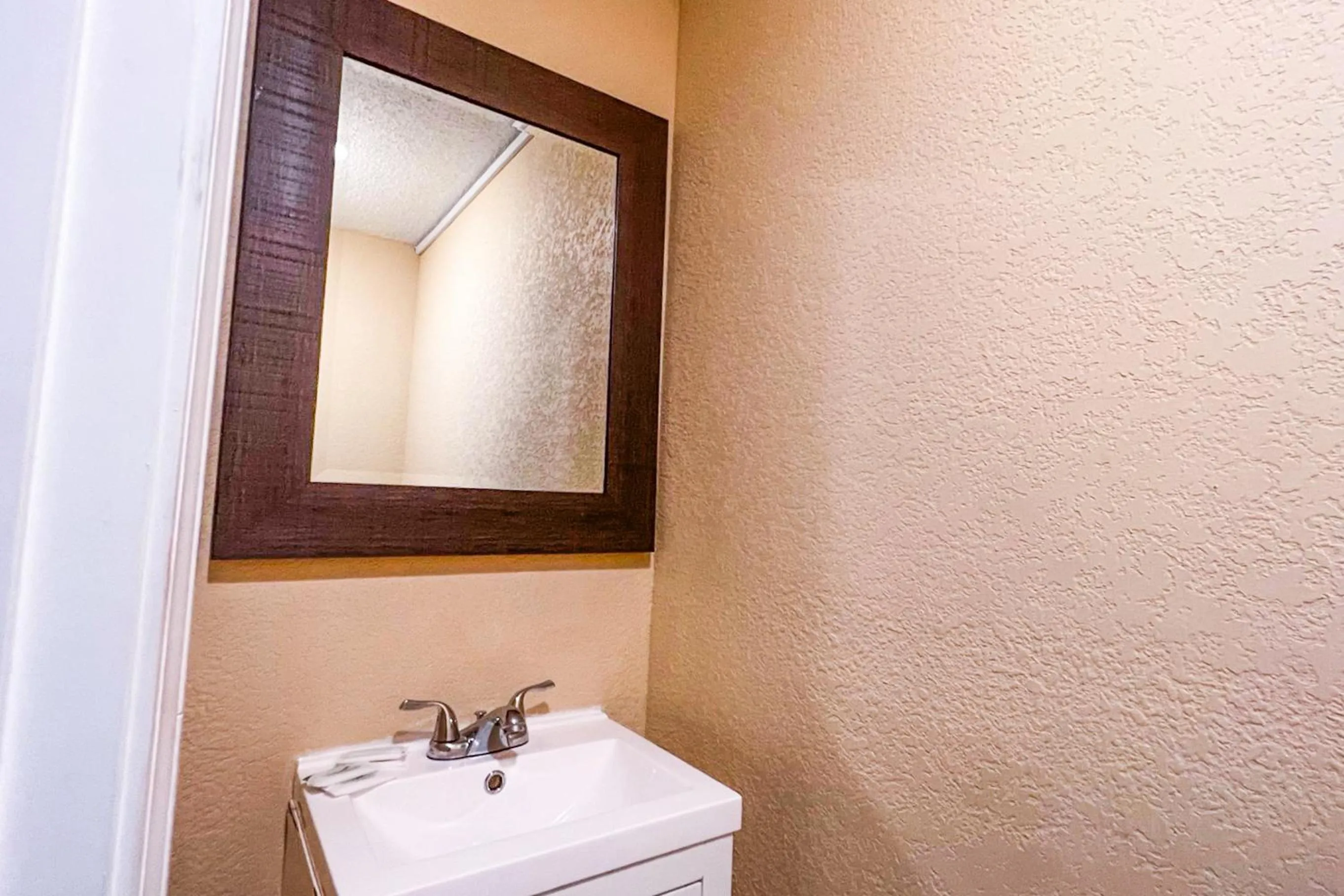 Bathroom in Crepe Myrtle by OYO