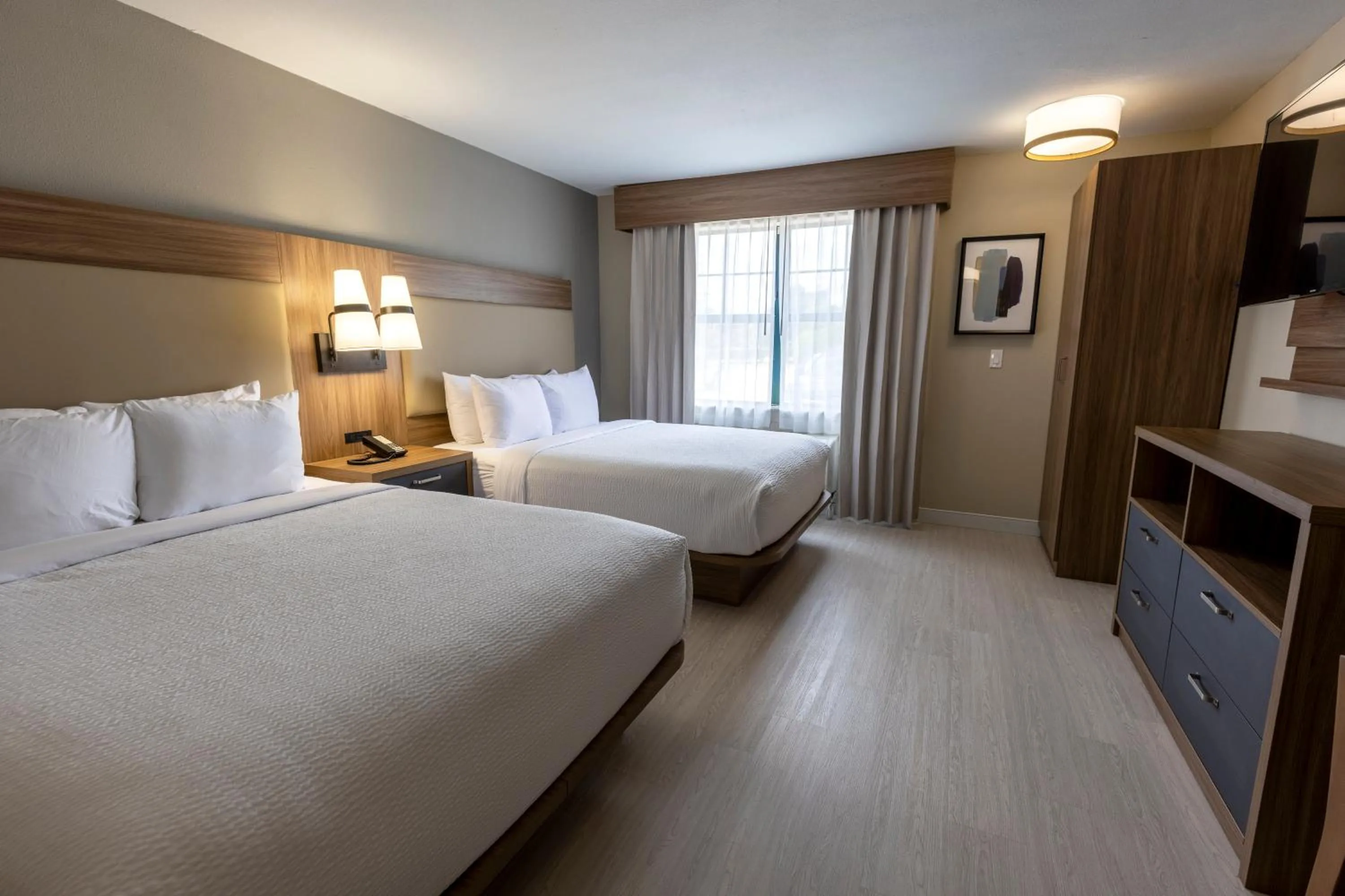 Bed in Sonesta ES Suites Lafayette Airport Extended Stay