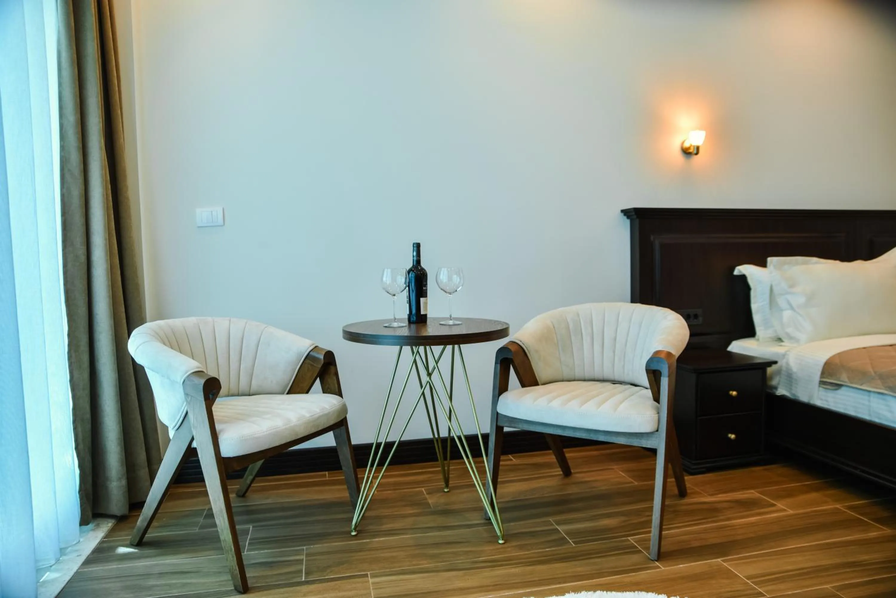 Seating area, Bed in Padam Hotel & SPA